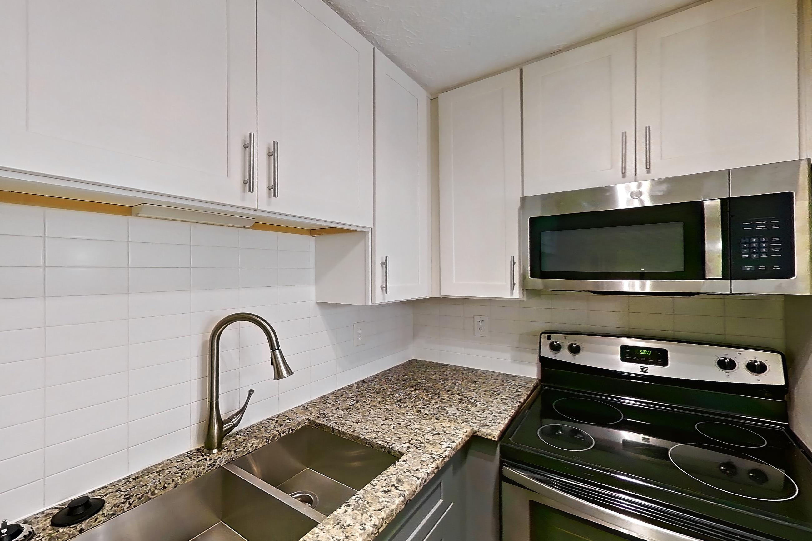 Kitchen in Apartment 2201j at Cortland at the Village, A3aR - The Adair A floor plan