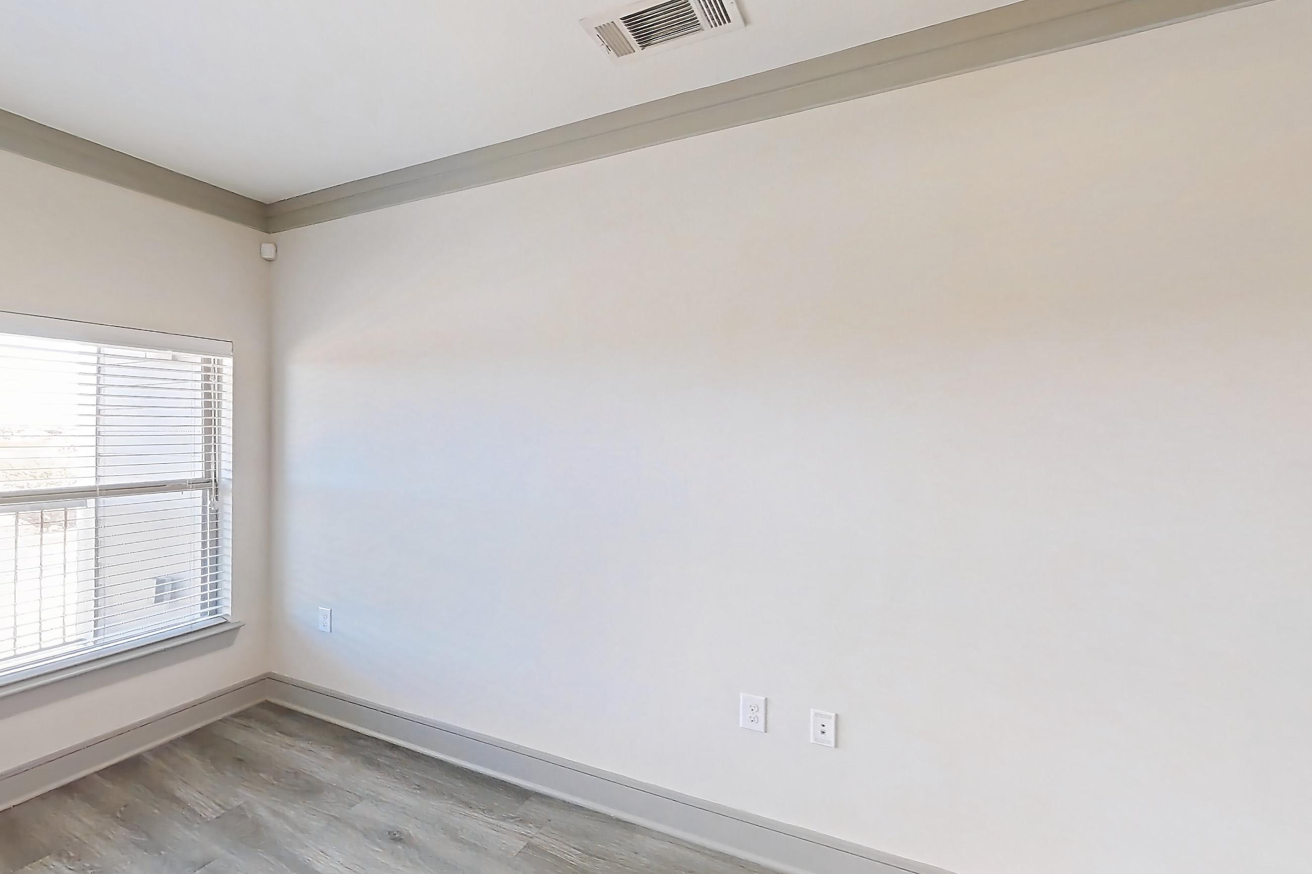 Living room in Apartment 18211 at Cortland Phillips Creek Ranch, B1 floor plan