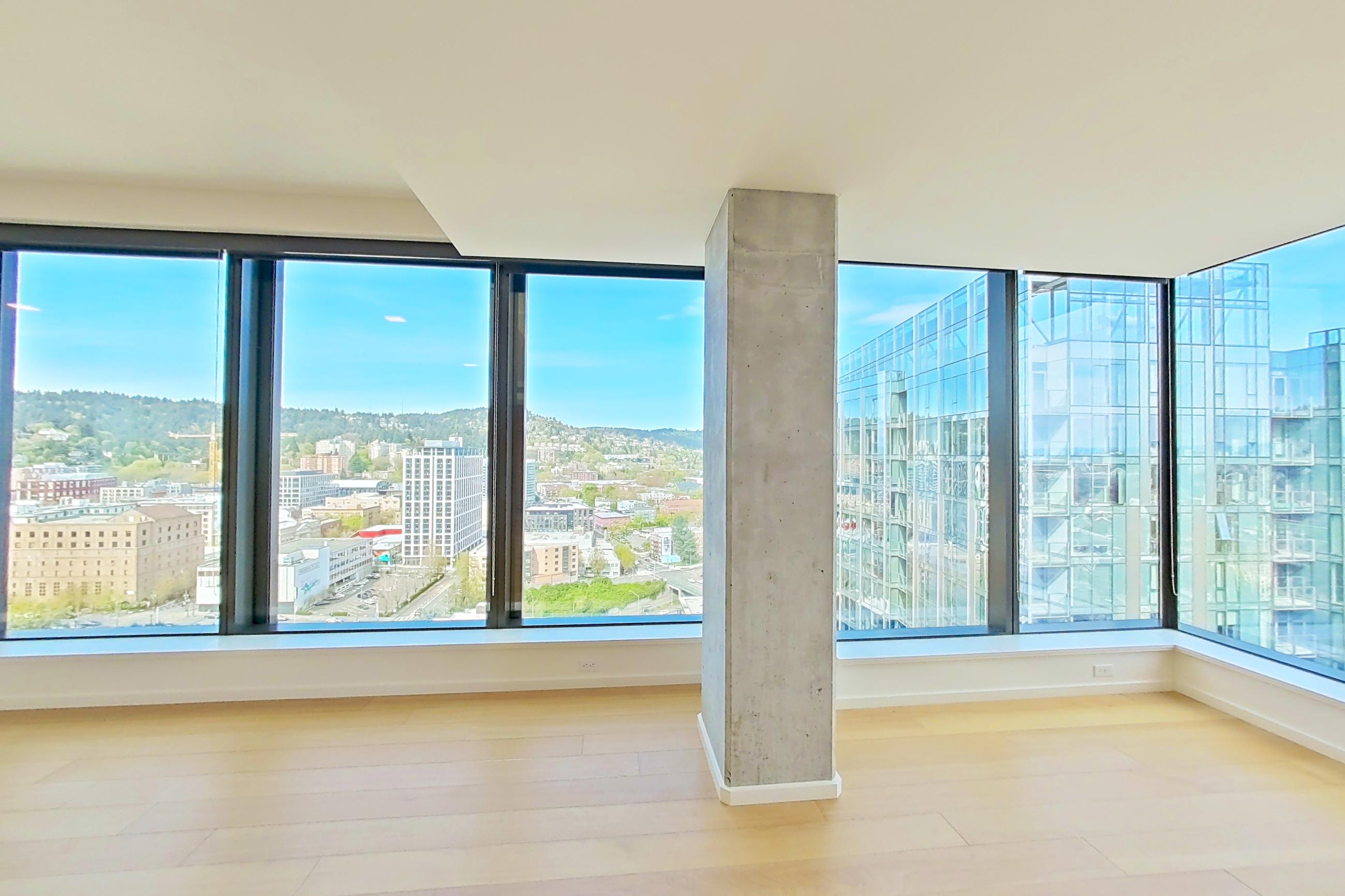 Living room with city view, Apartment 2404 at The Residences at 11W