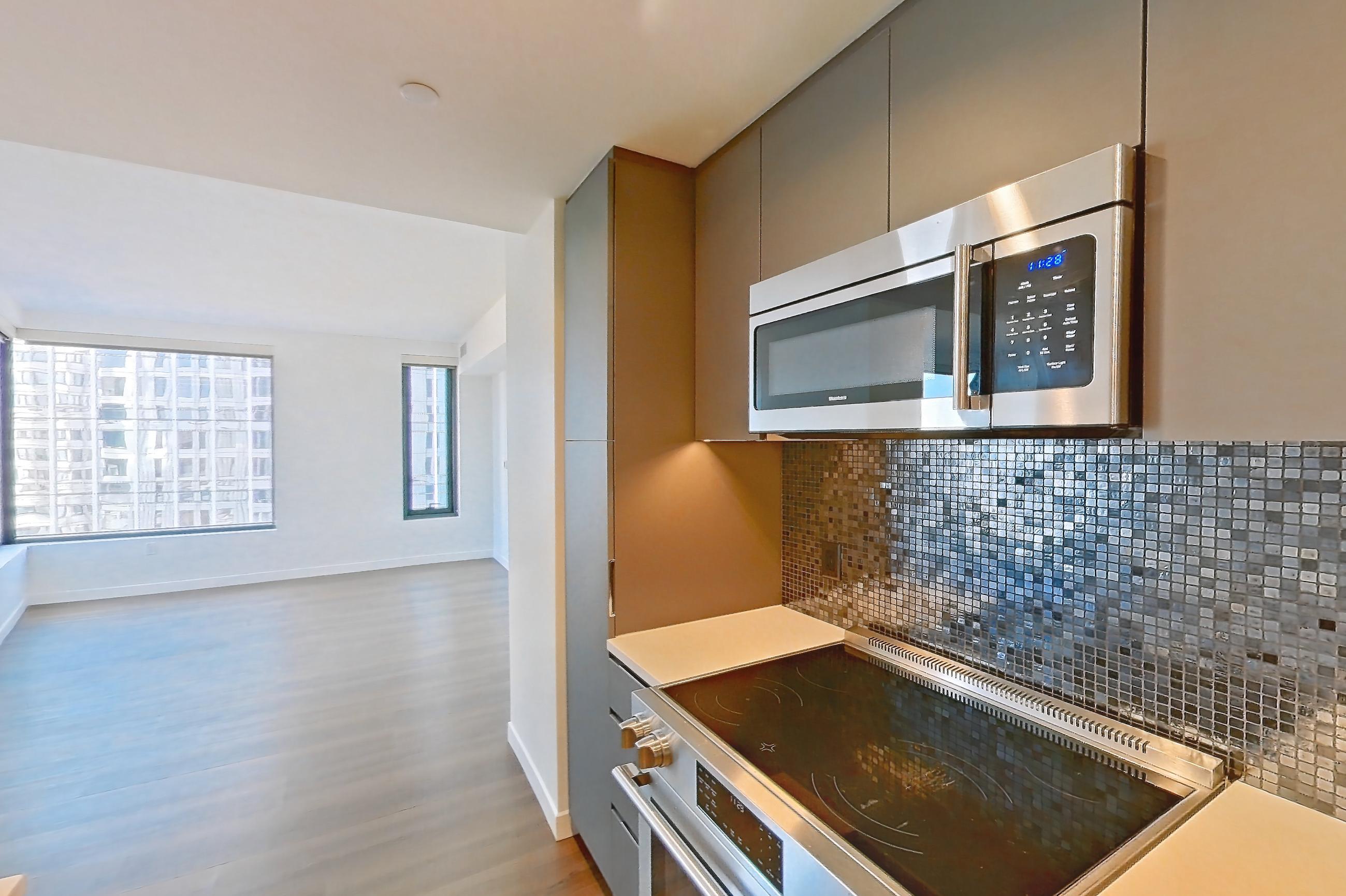 Kitchen 1 in Apartment 1501 at The Sudbury, AD6 | 1 Bed | 1 Bath | Den floor plan