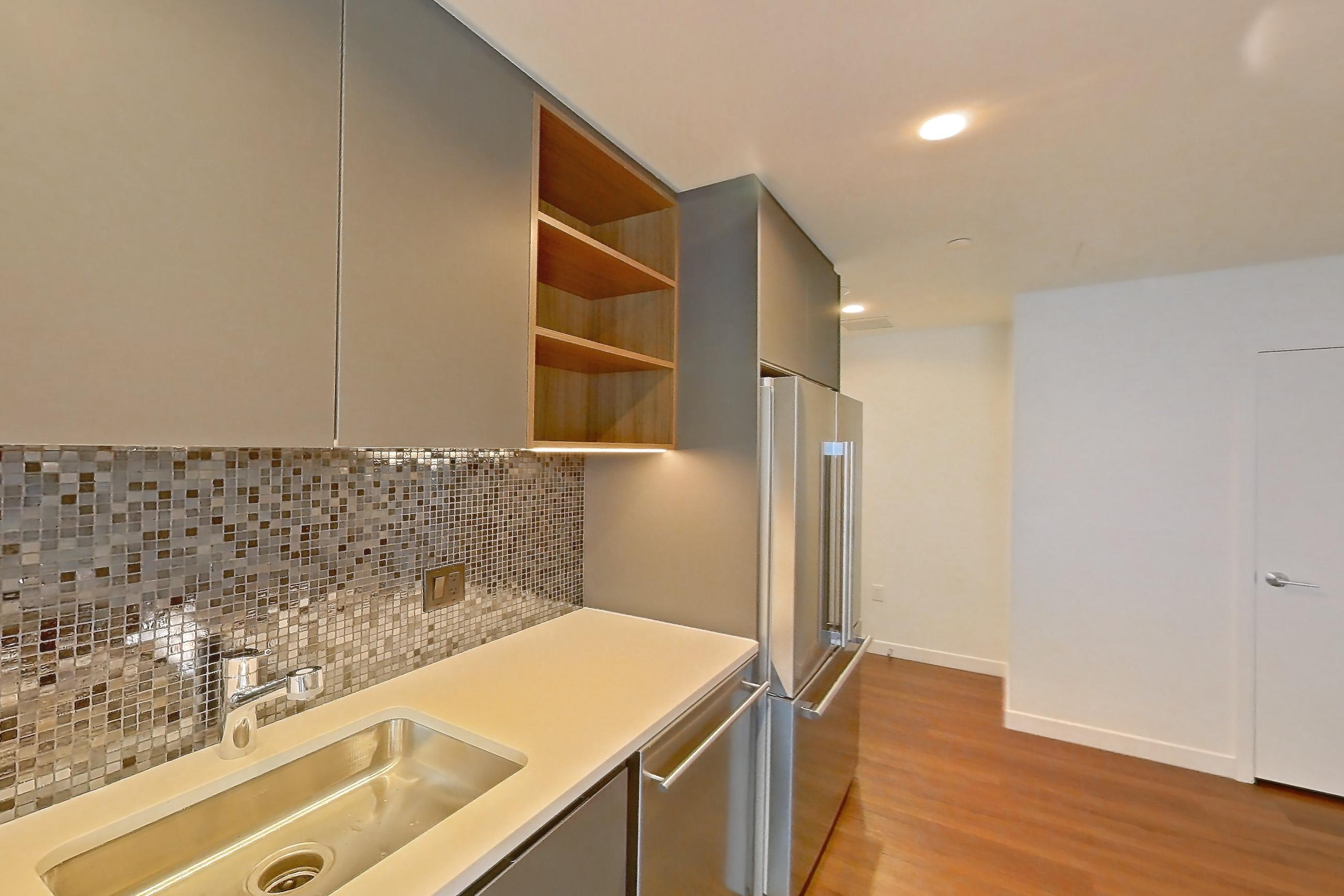 Kitchen 1 in Apartment 1501 at The Sudbury, AD6 | 1 Bed | 1 Bath | Den floor plan