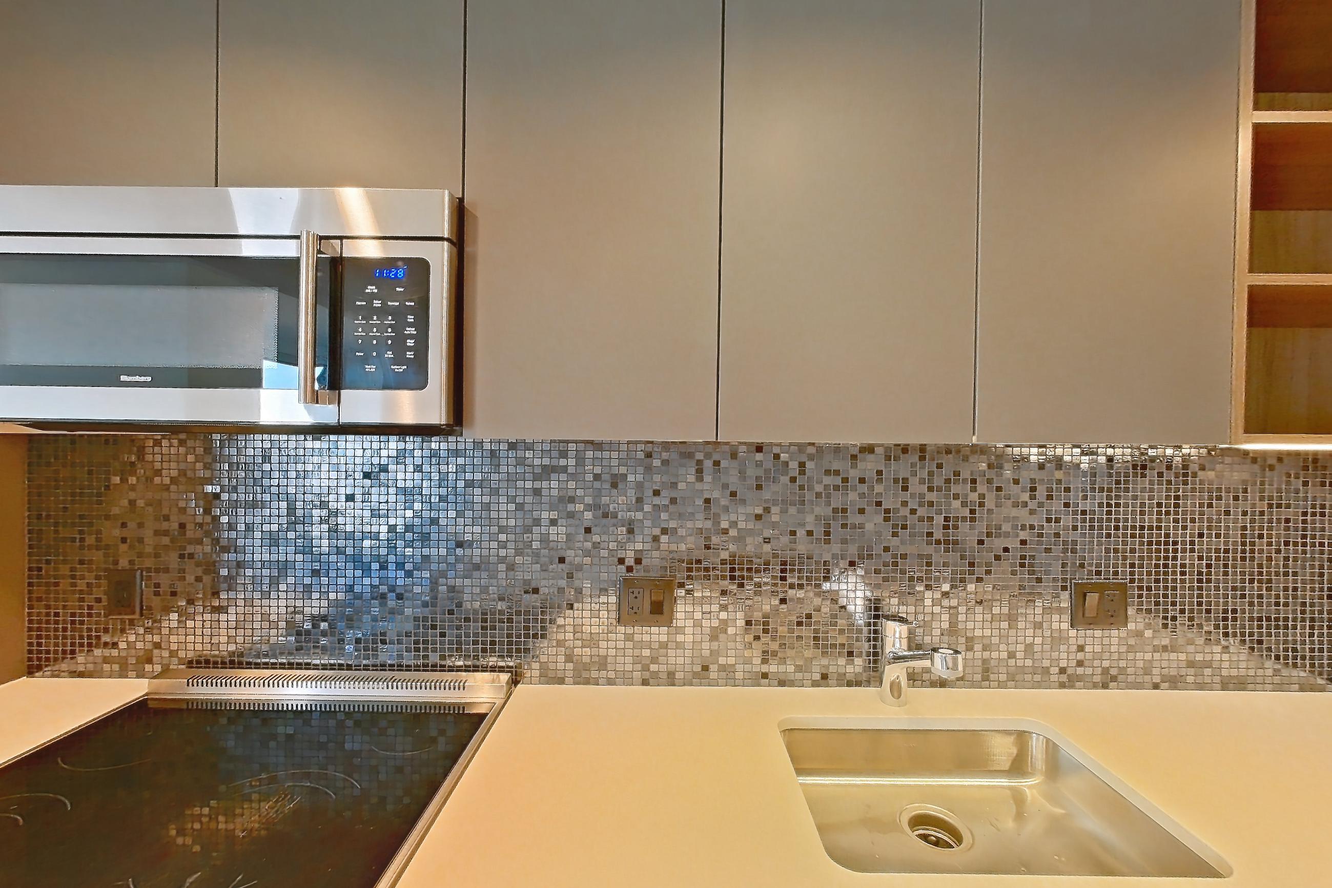 Kitchen 1 in Apartment 1501 at The Sudbury, AD6 | 1 Bed | 1 Bath | Den floor plan