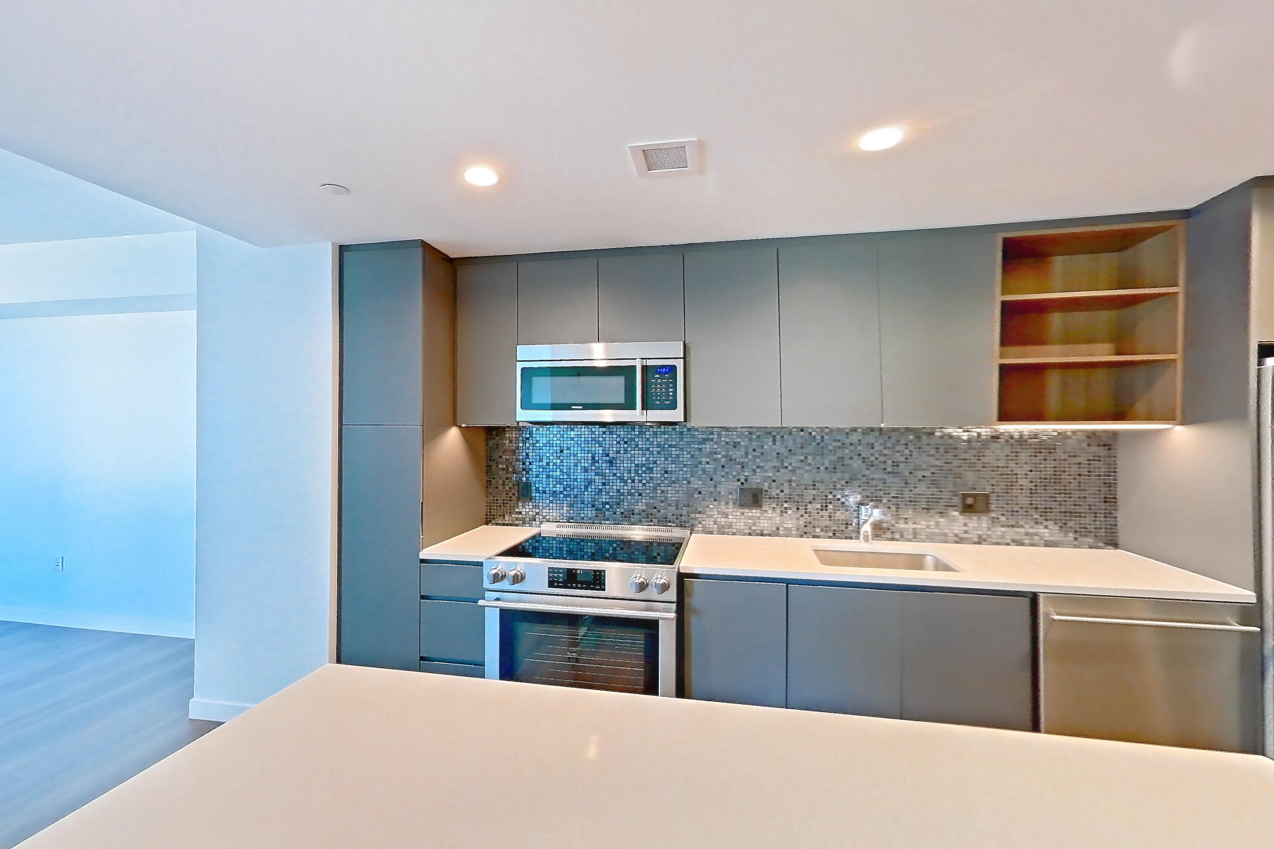 Kitchen 2 in Apartment 1501 at The Sudbury, AD6 | 1 Bed | 1 Bath | Den floor plan