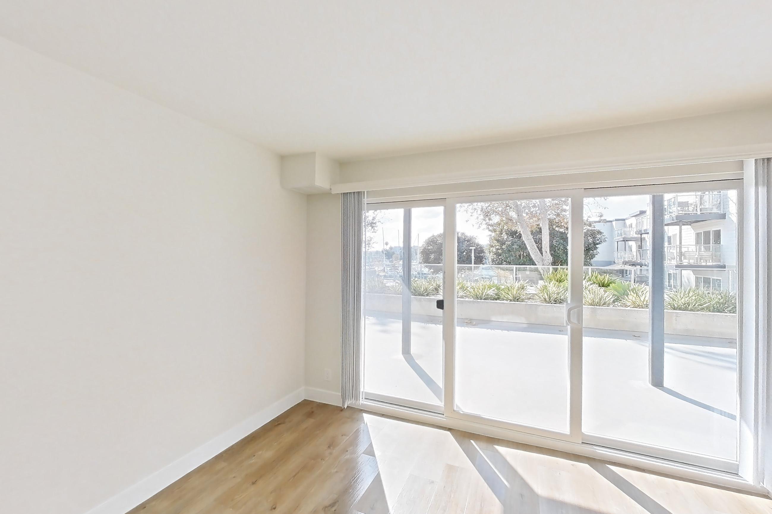 Living room in Apartment 4202 at Wayfarer Apartments + Marina, 1DA floor plan