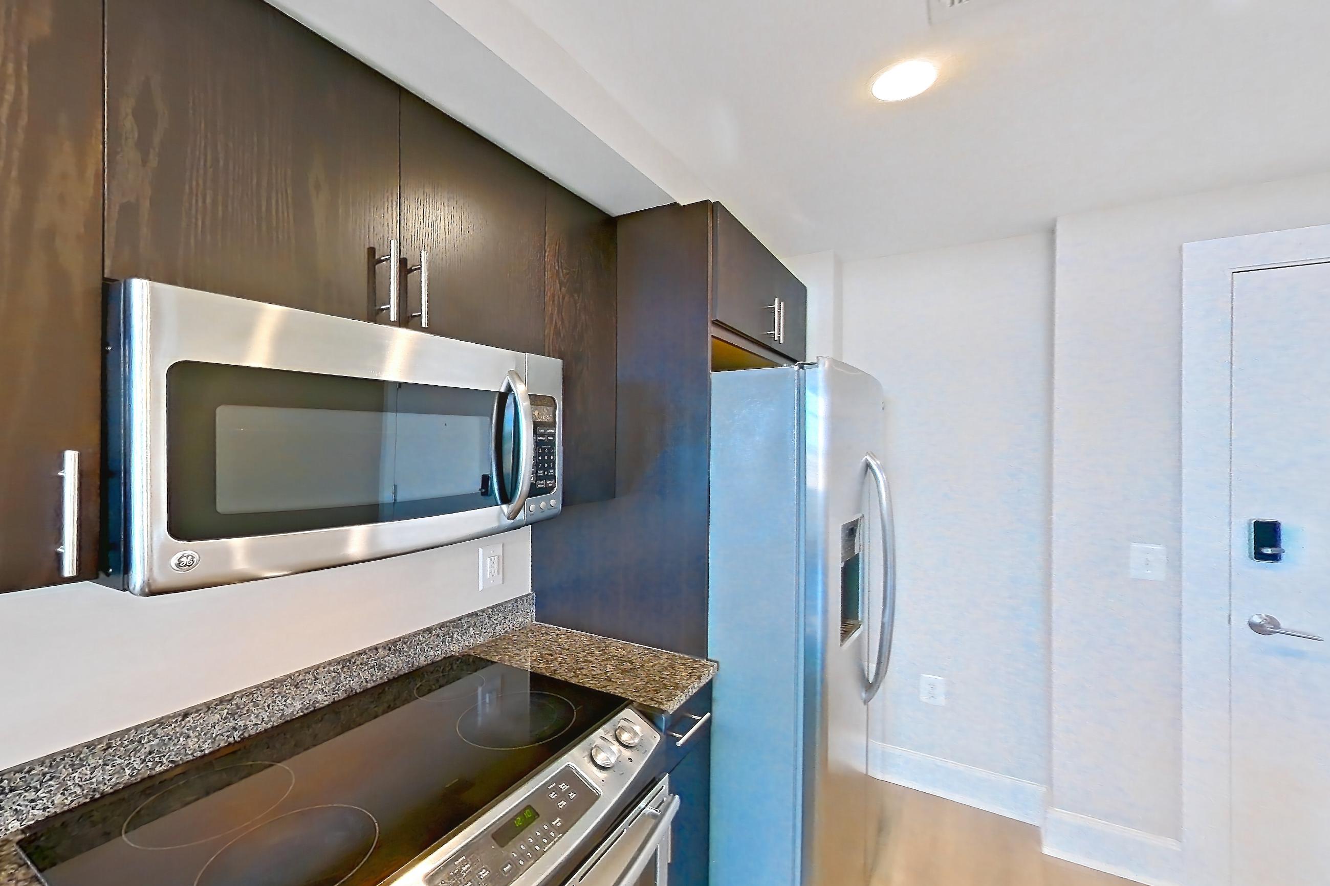 Kitchen in Apartment 0626 at The Avant at Reston Town Center, A1 floor plan