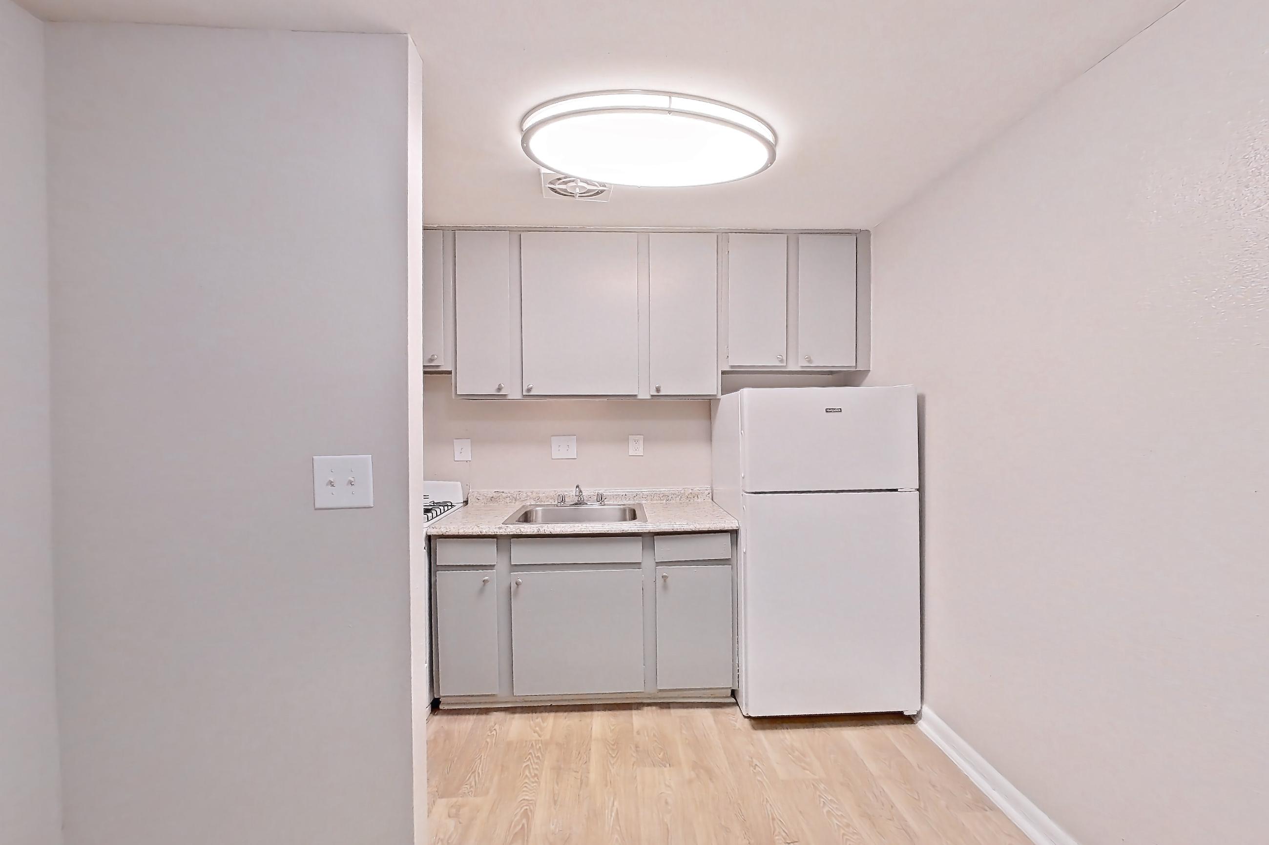 Dining room in a Edgewood floor plan apartment, representative of Apartment H1497B at The Legacy at Druid Hills