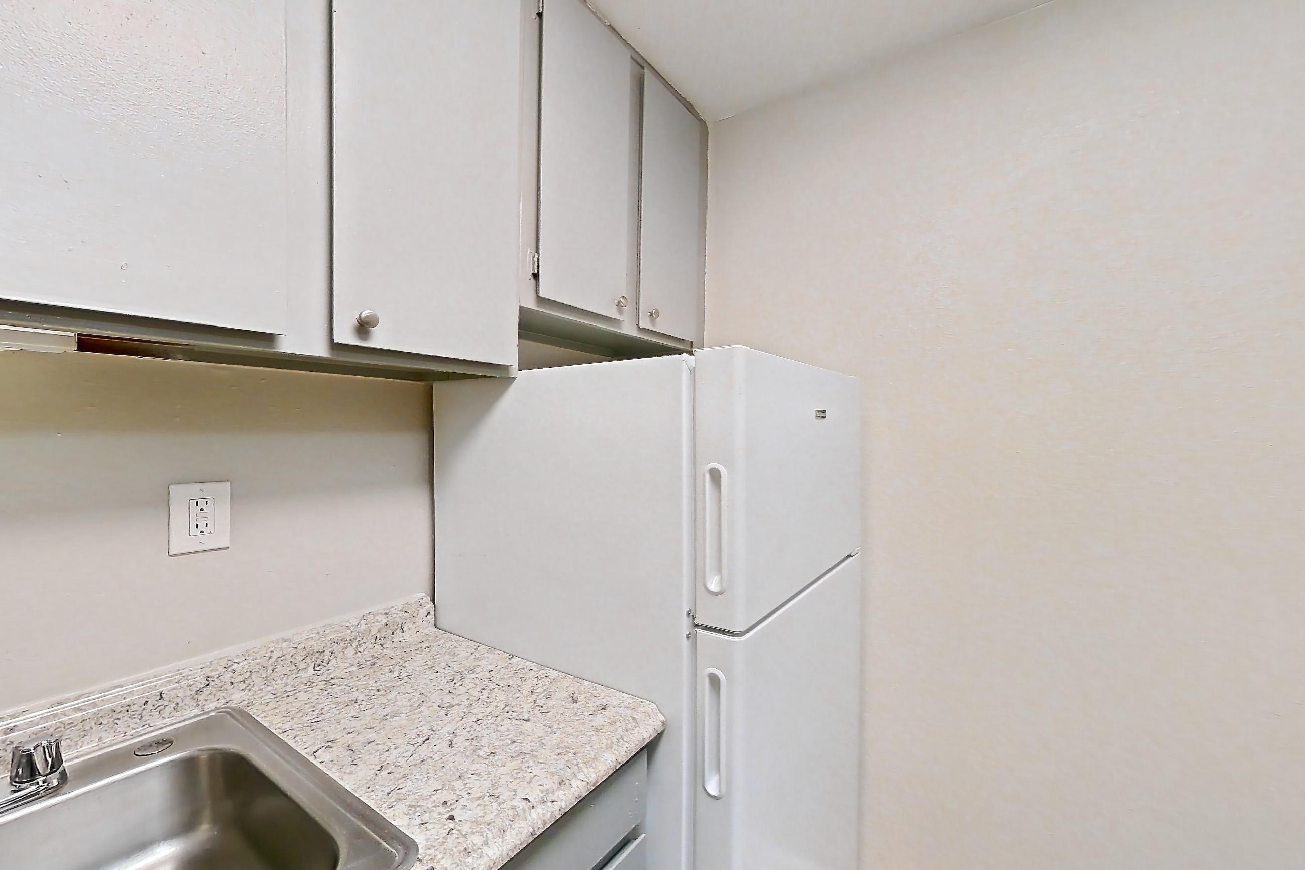 Kitchen in a Edgewood floor plan apartment, representative of Apartment H1497B at The Legacy at Druid Hills