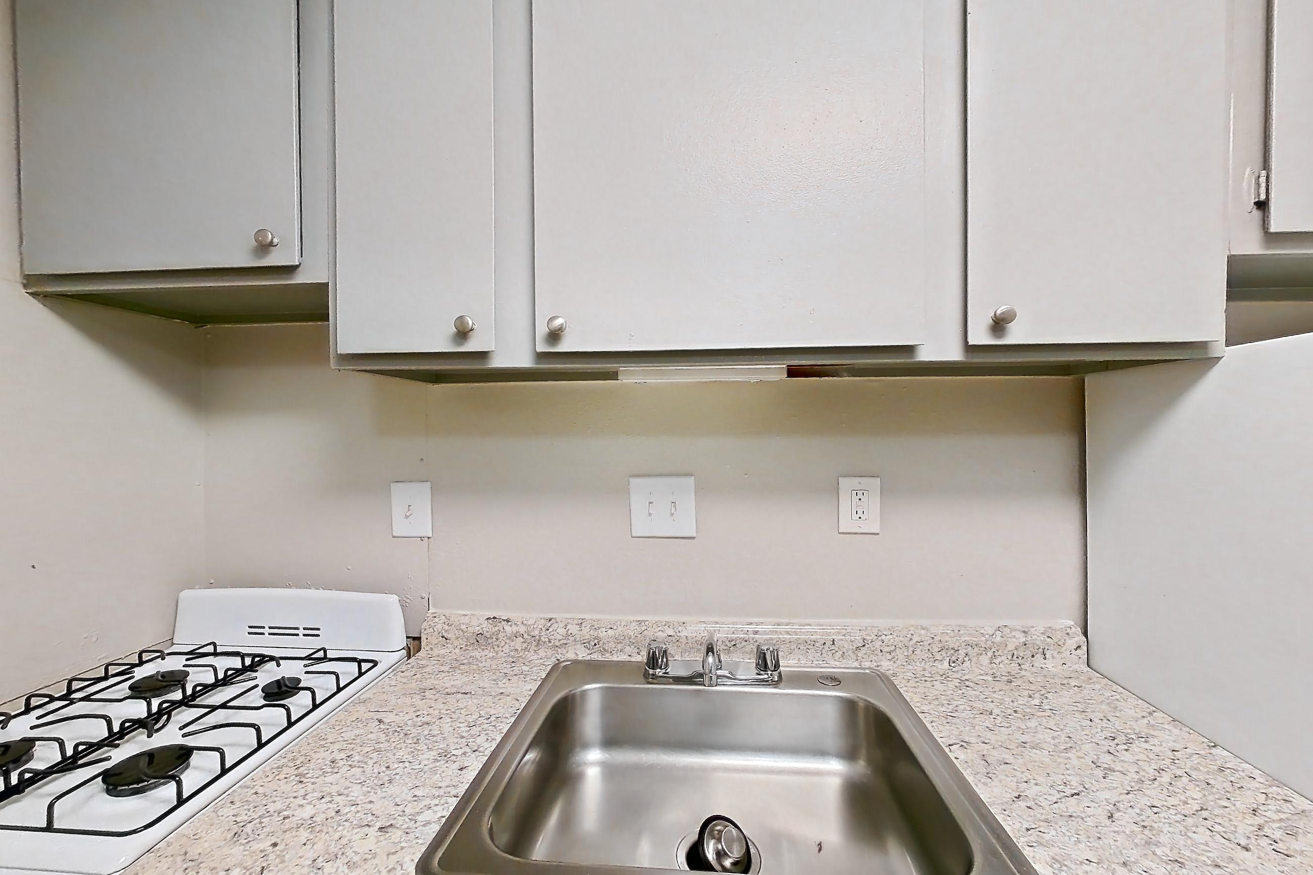 Kitchen in a Edgewood floor plan apartment, representative of Apartment H1497B at The Legacy at Druid Hills