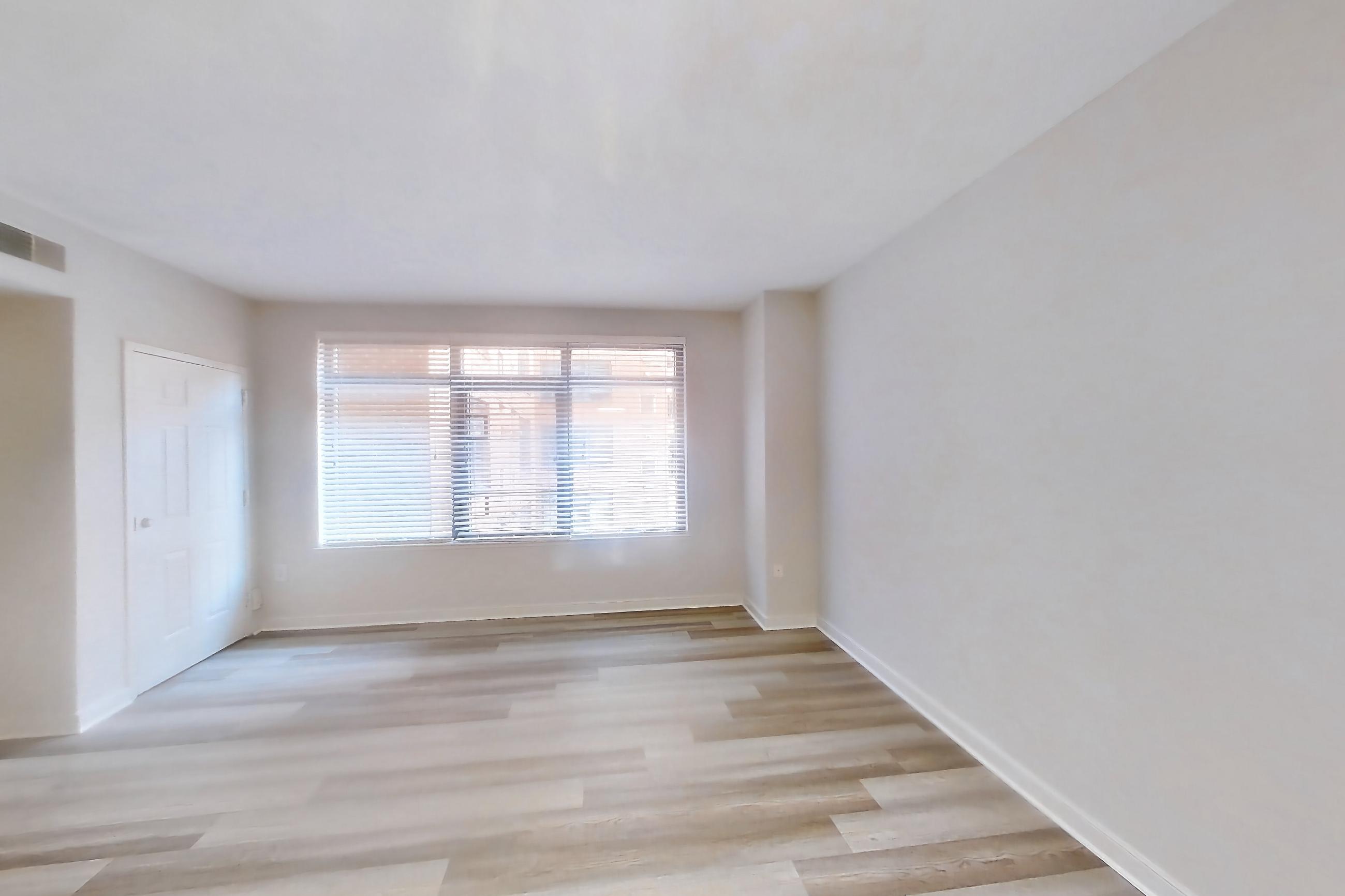 Kitchen with light wood-finish flooring, Apartment 324 at The Barton at Woodley