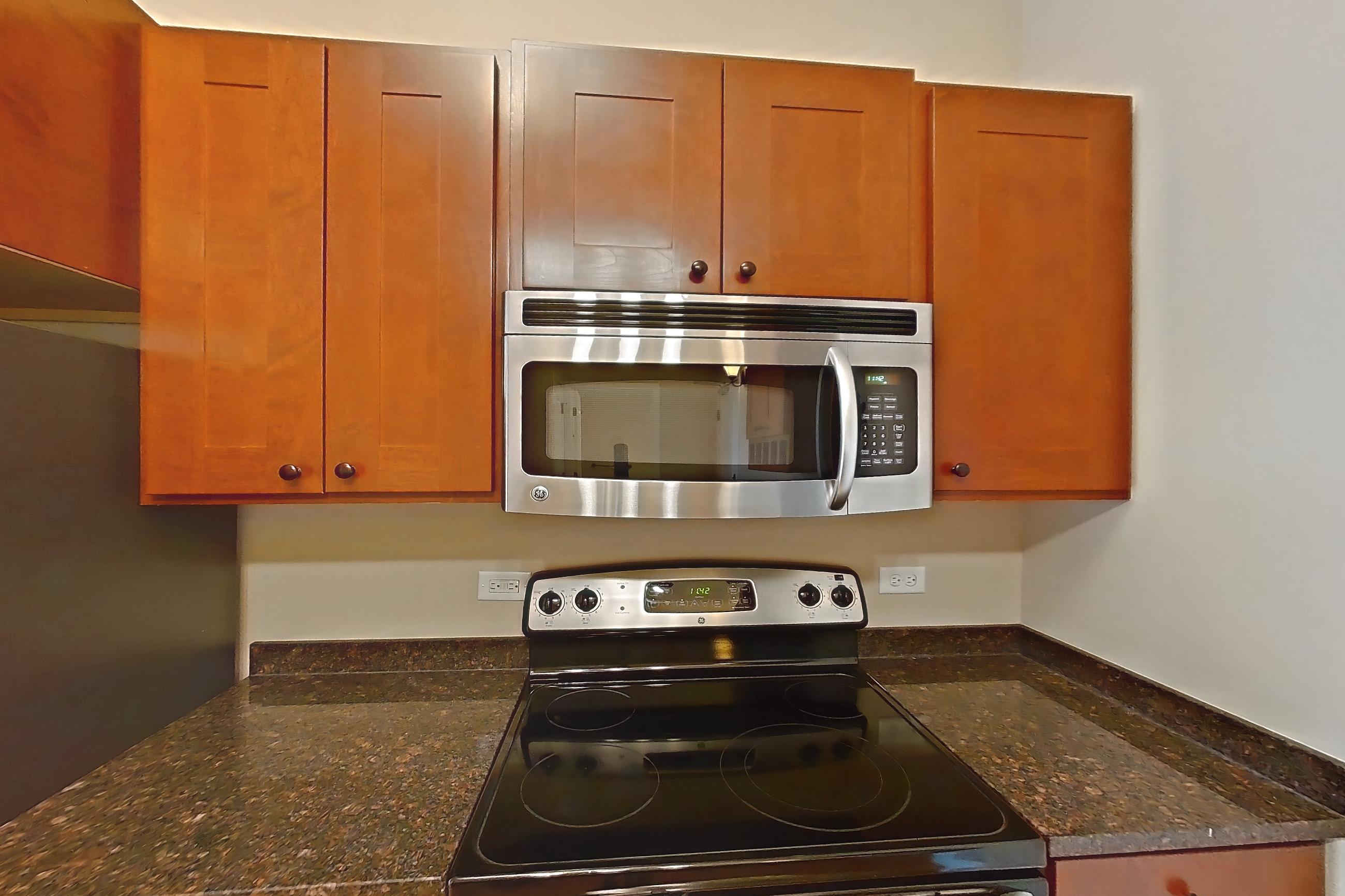 Kitchen in Apartment 0721 at Pioneer Endicott Apartments, 1BR/1BA floor plan