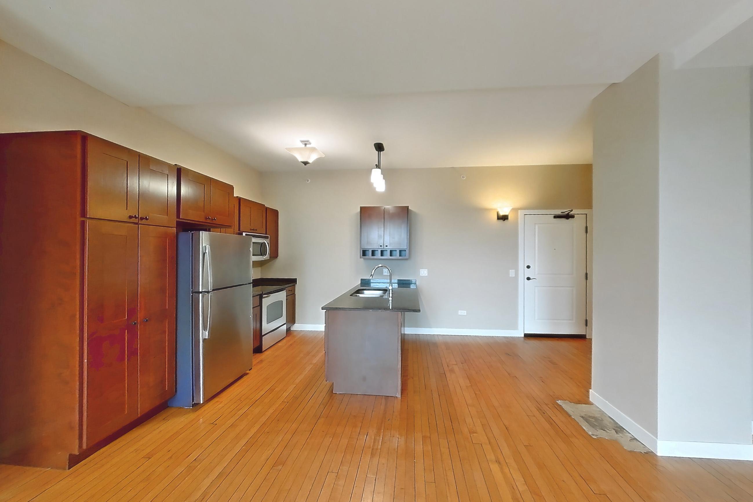 Living room in Apartment 0721 at Pioneer Endicott Apartments, 1BR/1BA floor plan