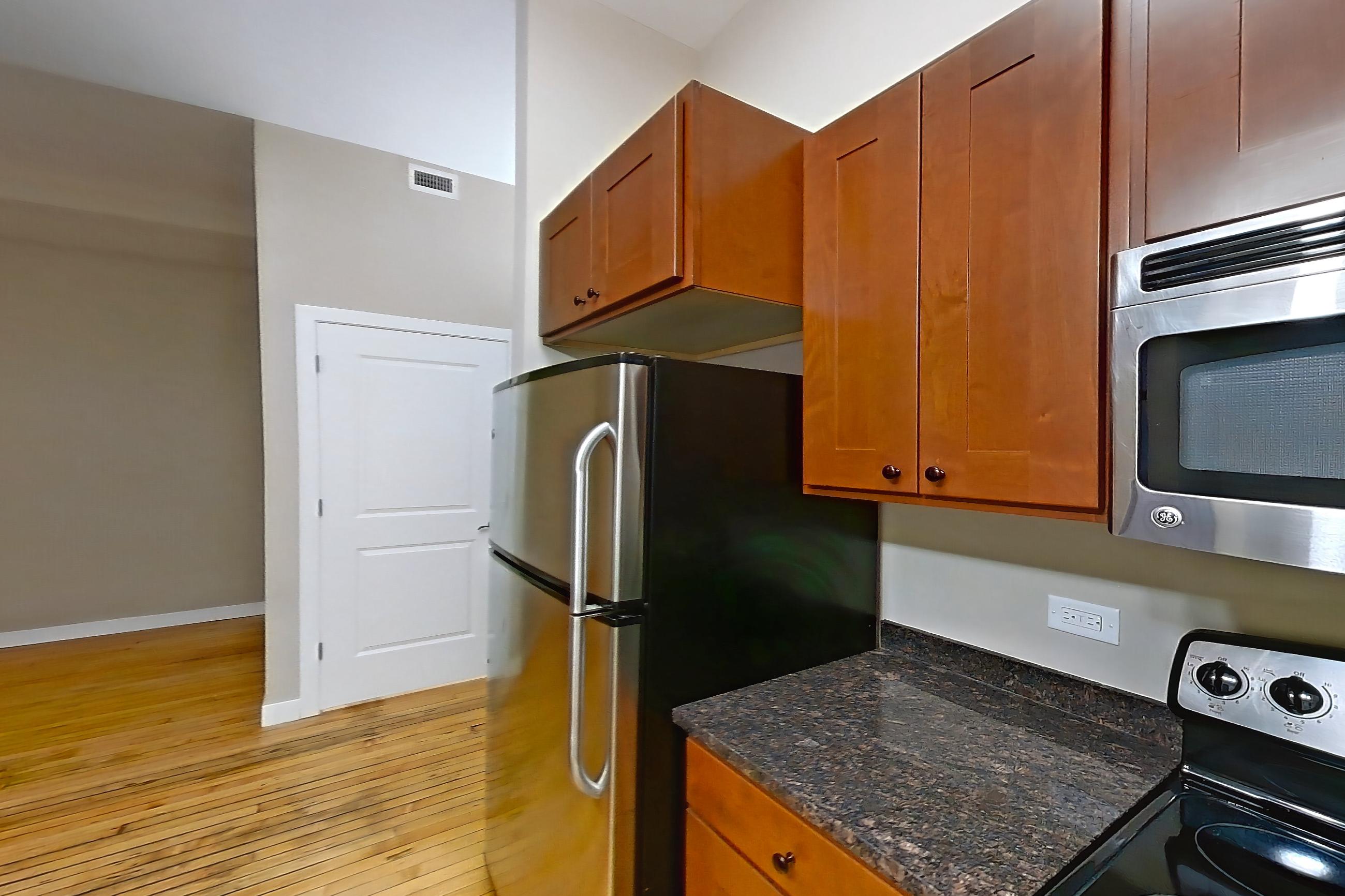 Kitchen in Apartment 0425 at Pioneer Endicott Apartments, Studios floor plan