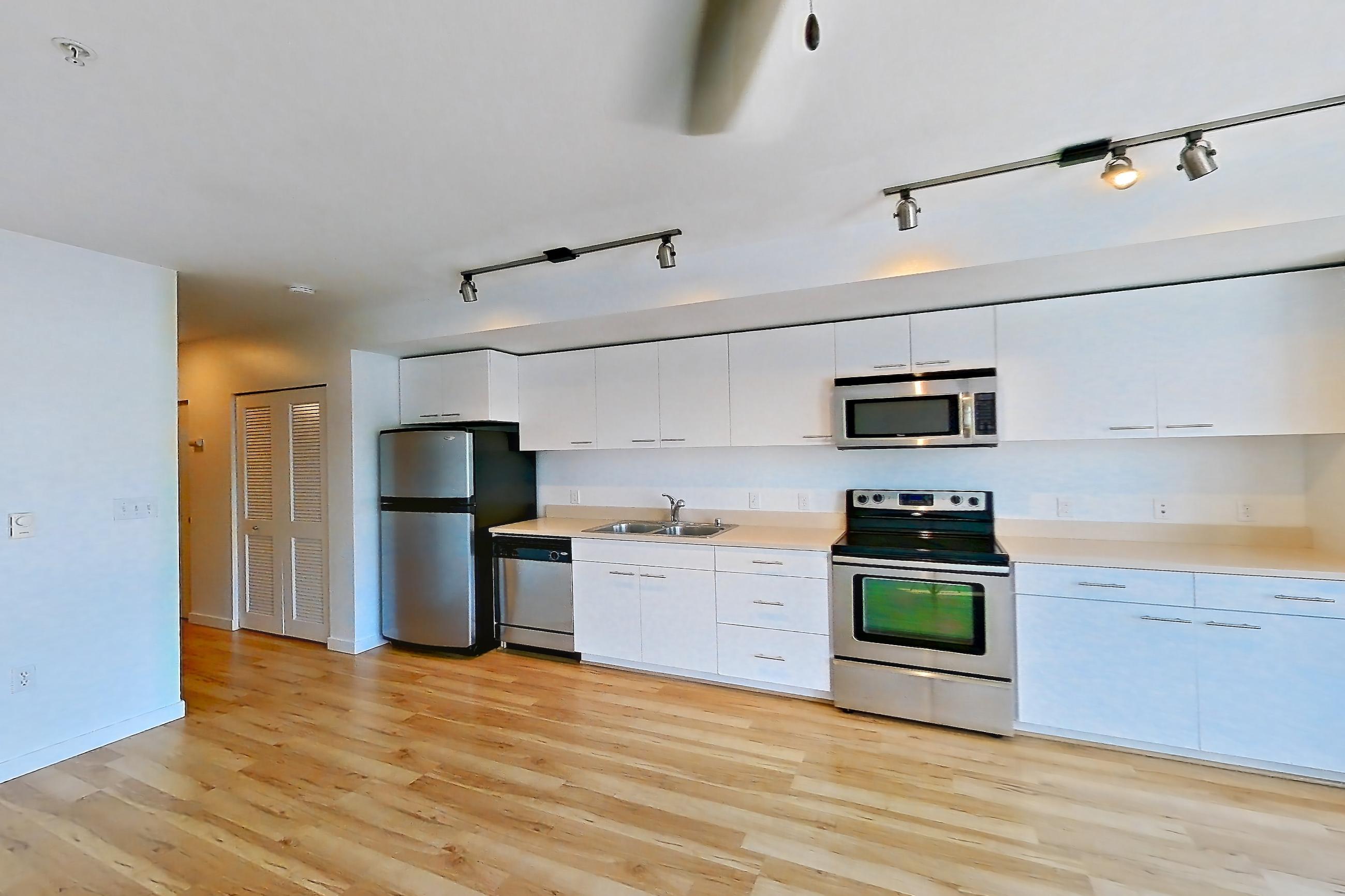 Living room in a Open 1 Bedroom 1 Bath A22.1 floor plan apartment, representative of Apartment 0237 at Circa Greenlake