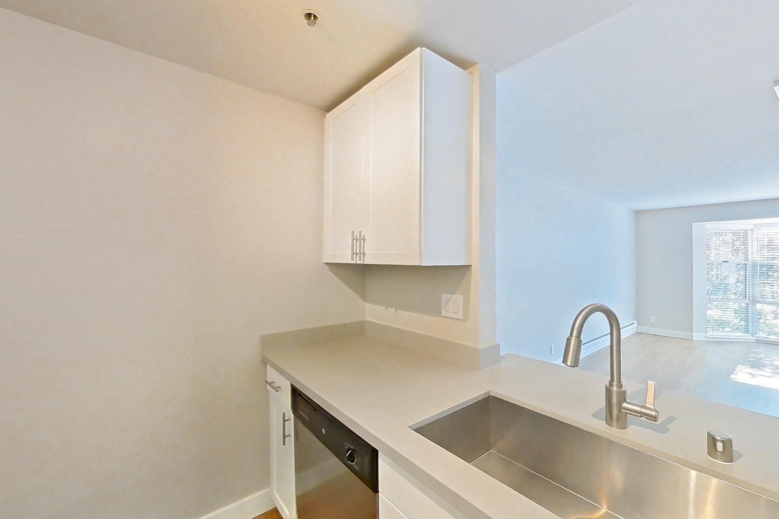 Kitchen in Apartment 4-203 at Bayside Village, 1J floor plan