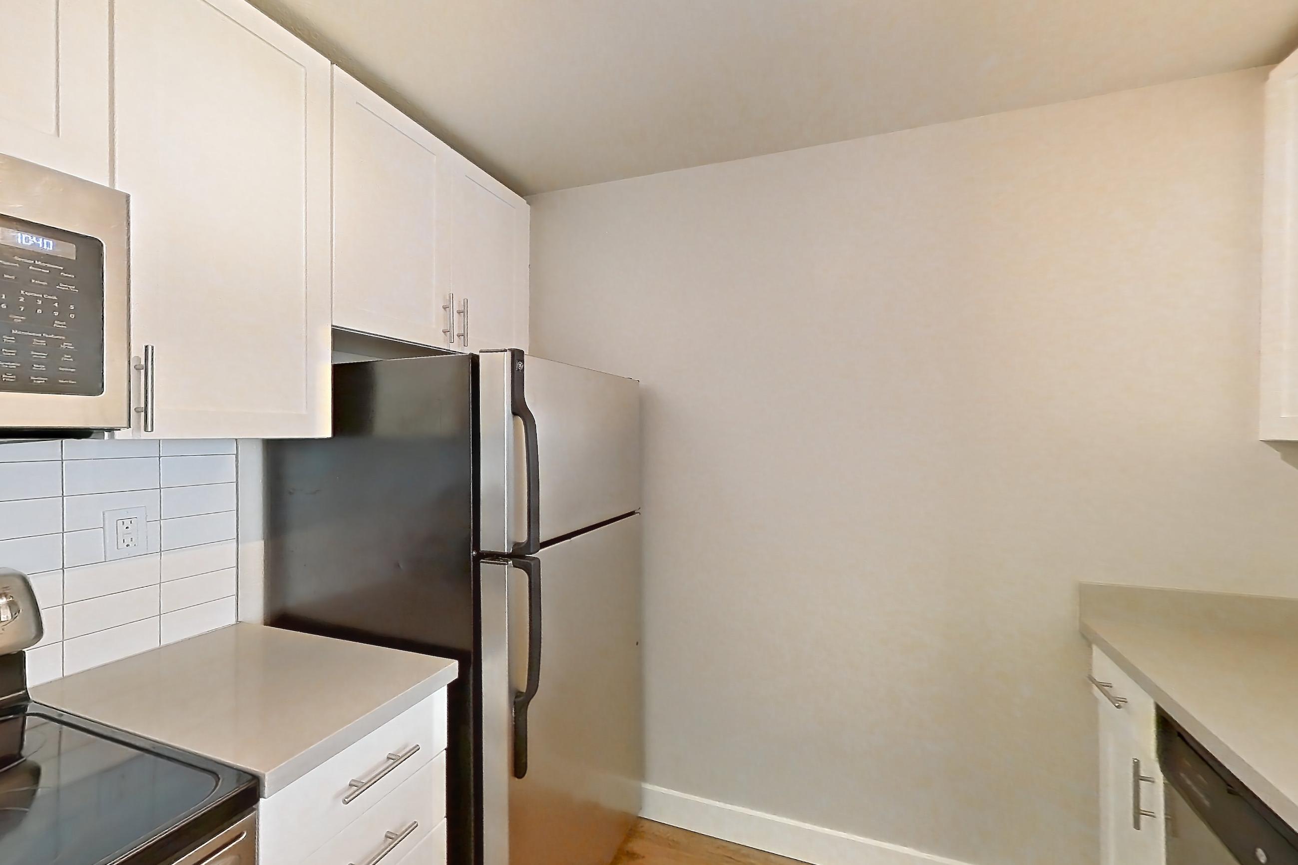 Kitchen in Apartment 4-203 at Bayside Village, 1J floor plan