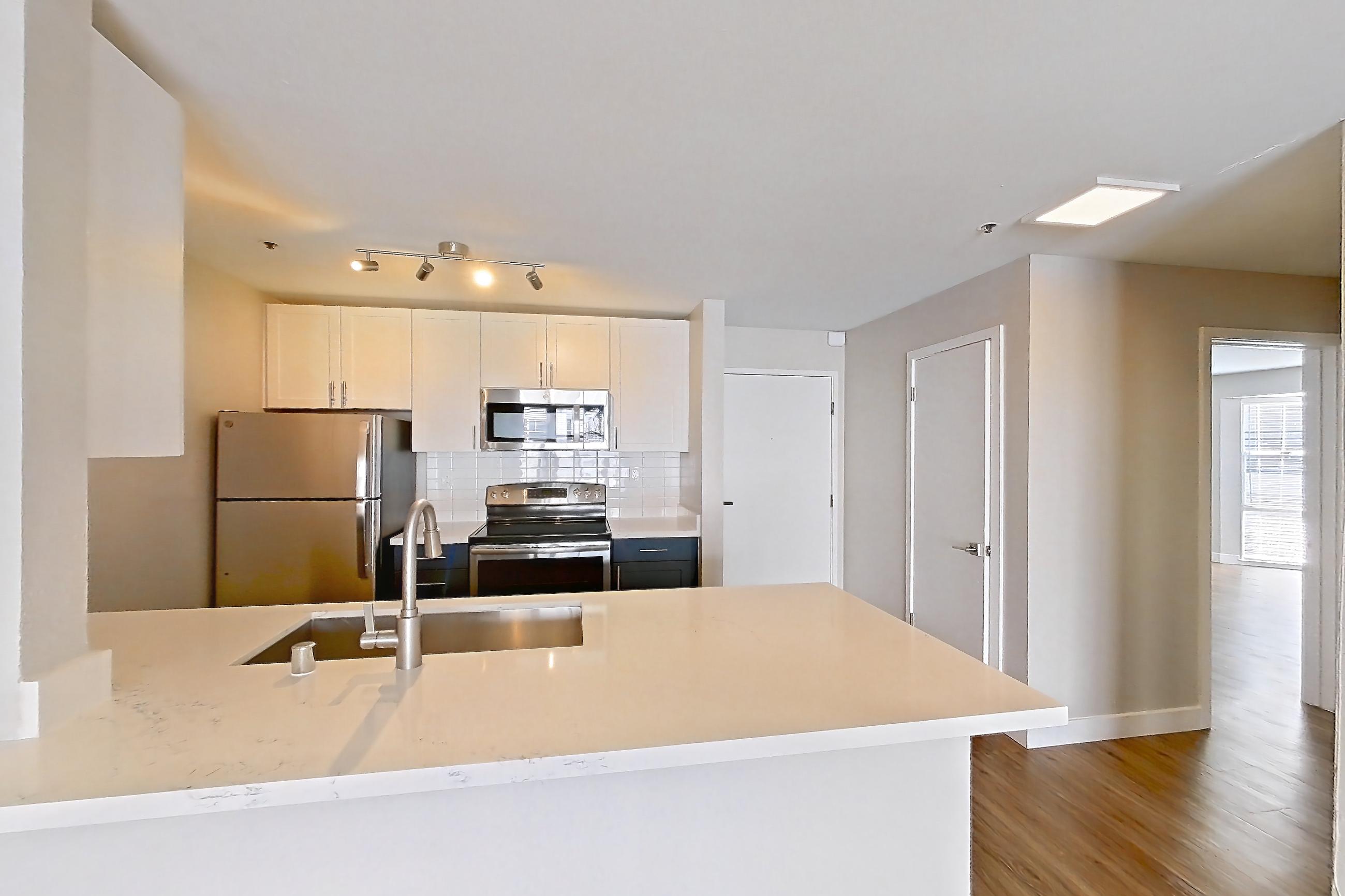 Dining room, Apartment 3-323 at Bayside Village