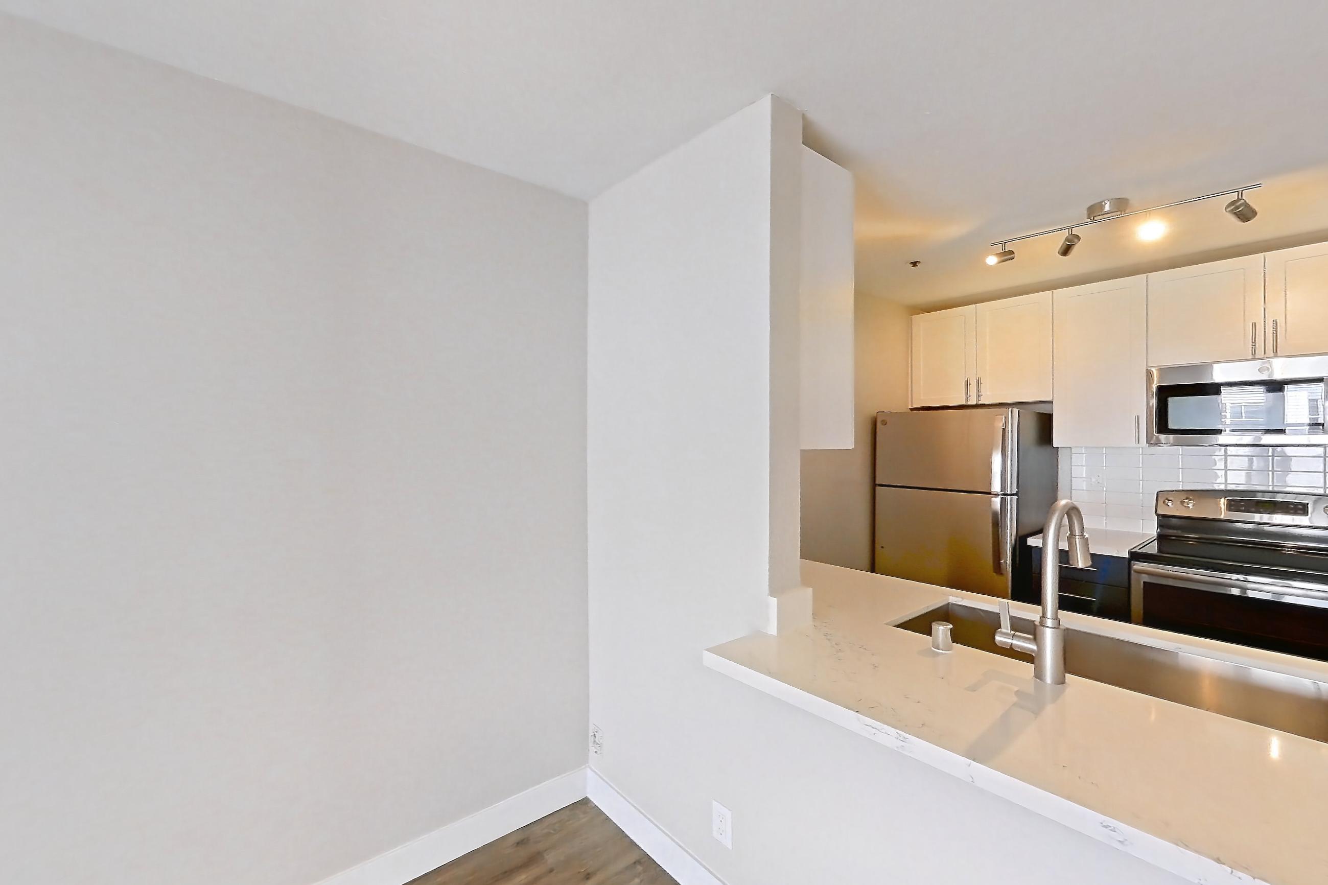 Dining room, Apartment 3-323 at Bayside Village