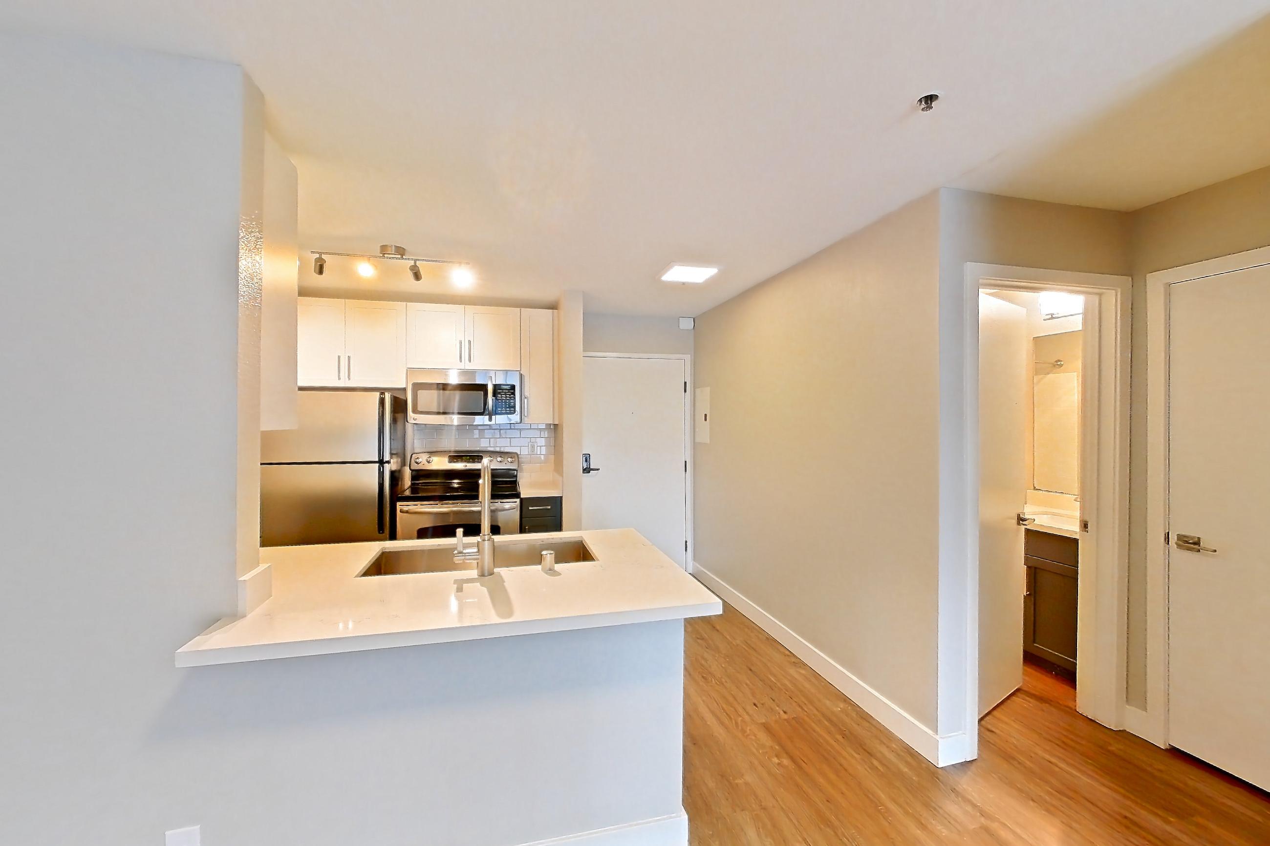 Dining room, Apartment 6-102 at Bayside Village
