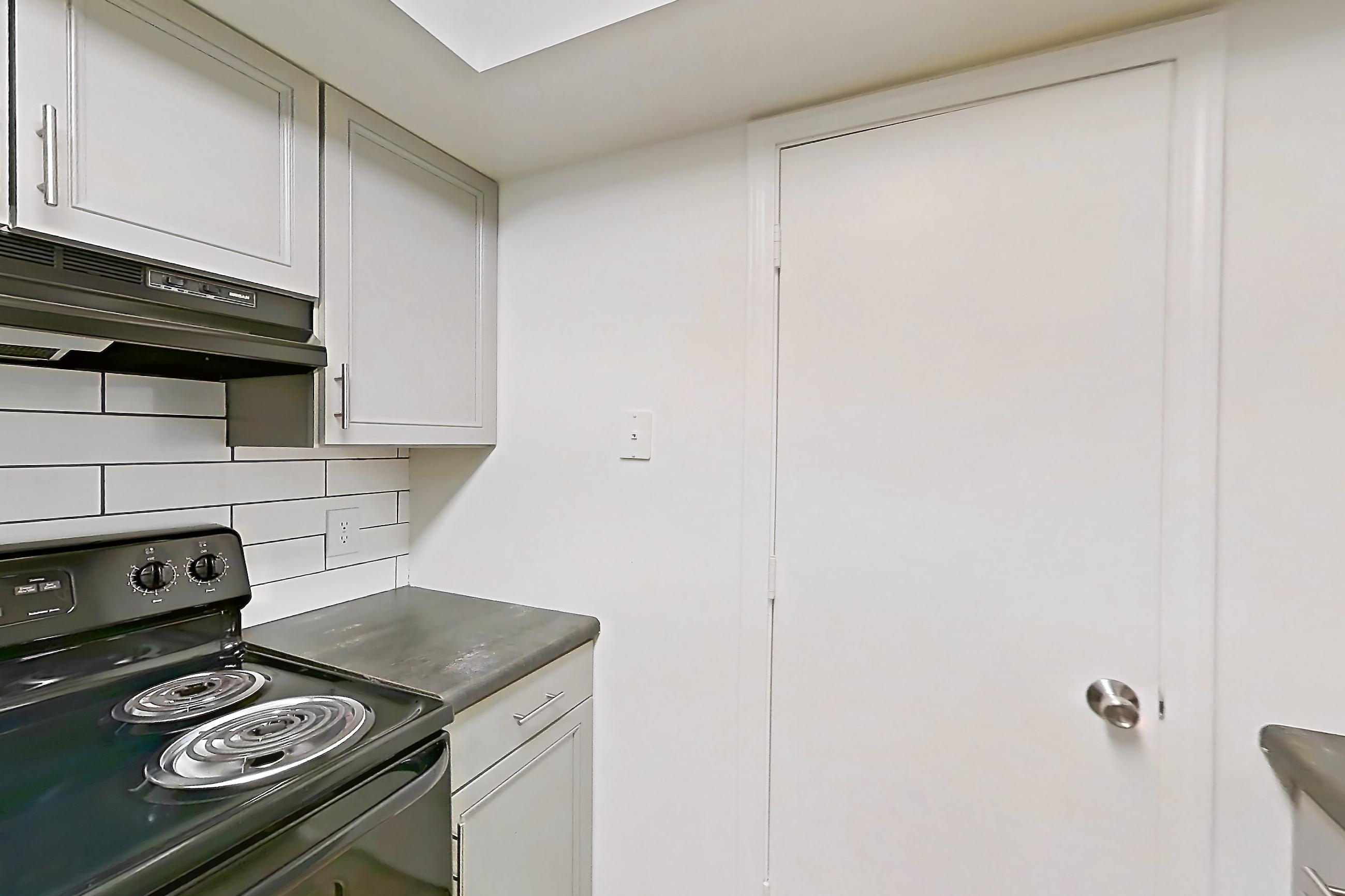 Kitchen in a Rhiems floor plan apartment, representative of Apartment 5323-4ST at Canterbury Green