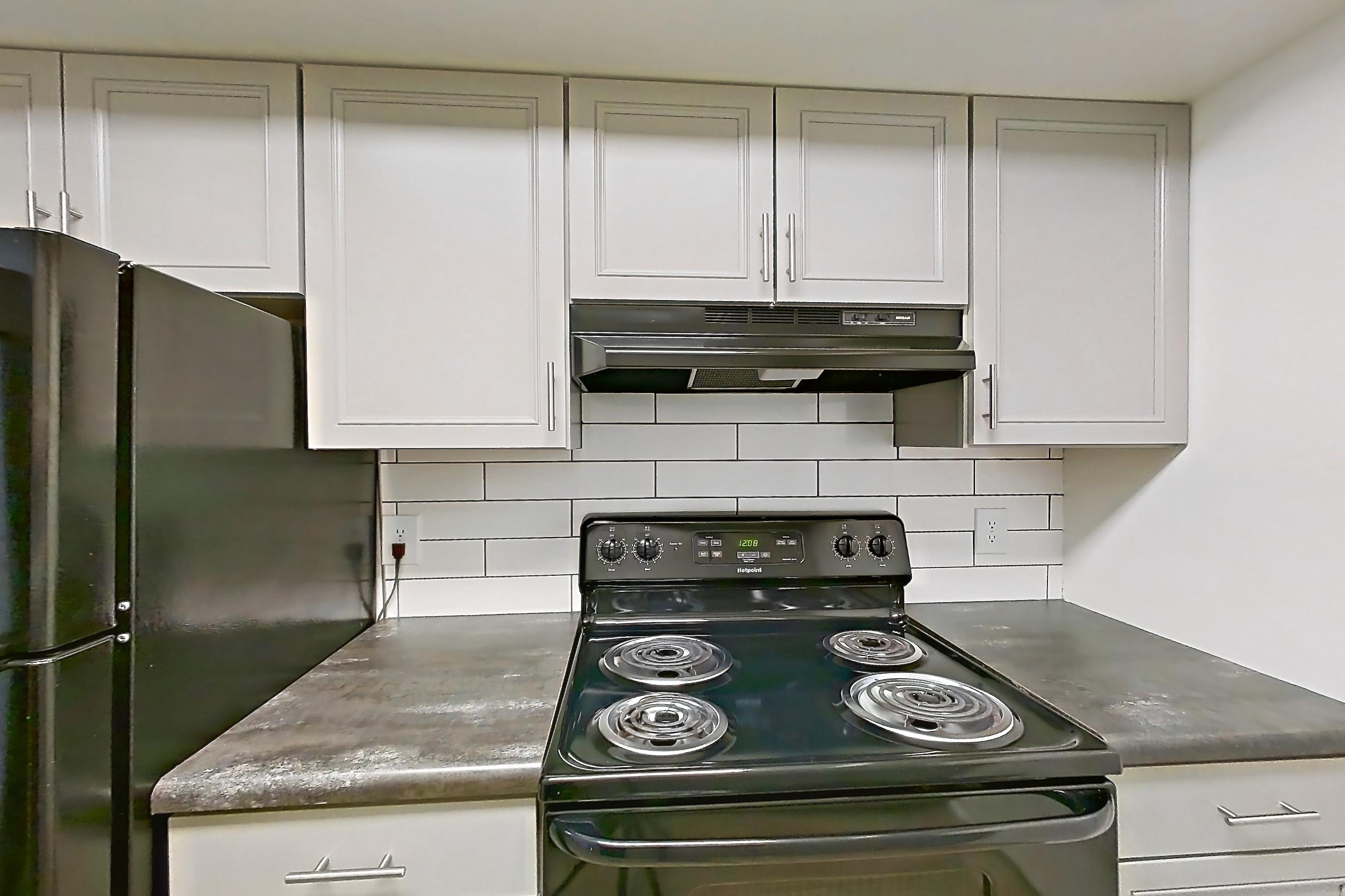 Kitchen in a Rhiems floor plan apartment, representative of Apartment 5323-4ST at Canterbury Green