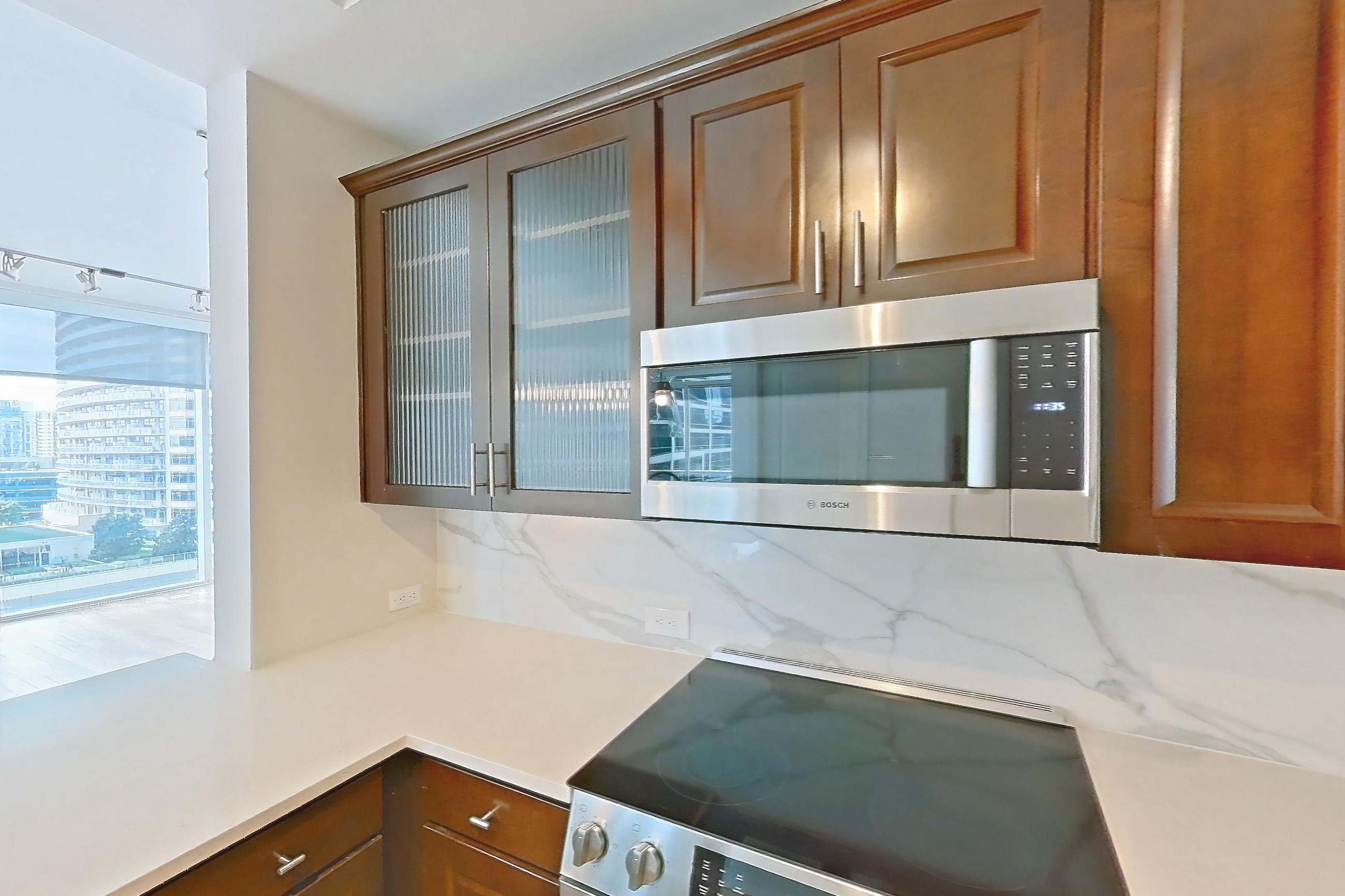 Kitchen in a B4a - Uptown floor plan apartment, representative of Apartment 2201 at Cortland on McKinney