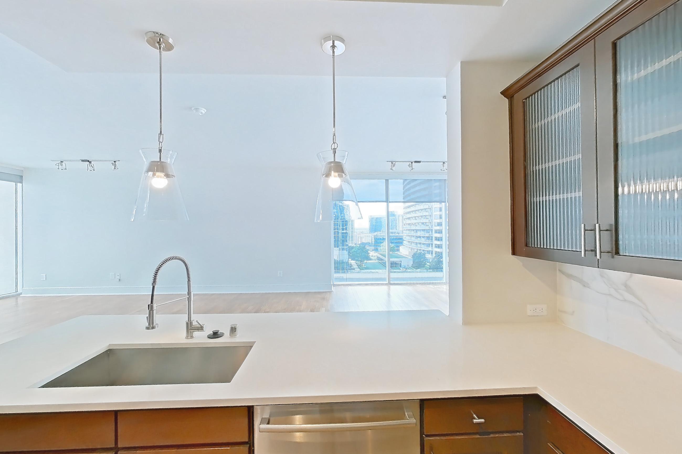 Kitchen in a B4a - Uptown floor plan apartment, representative of Apartment 2201 at Cortland on McKinney