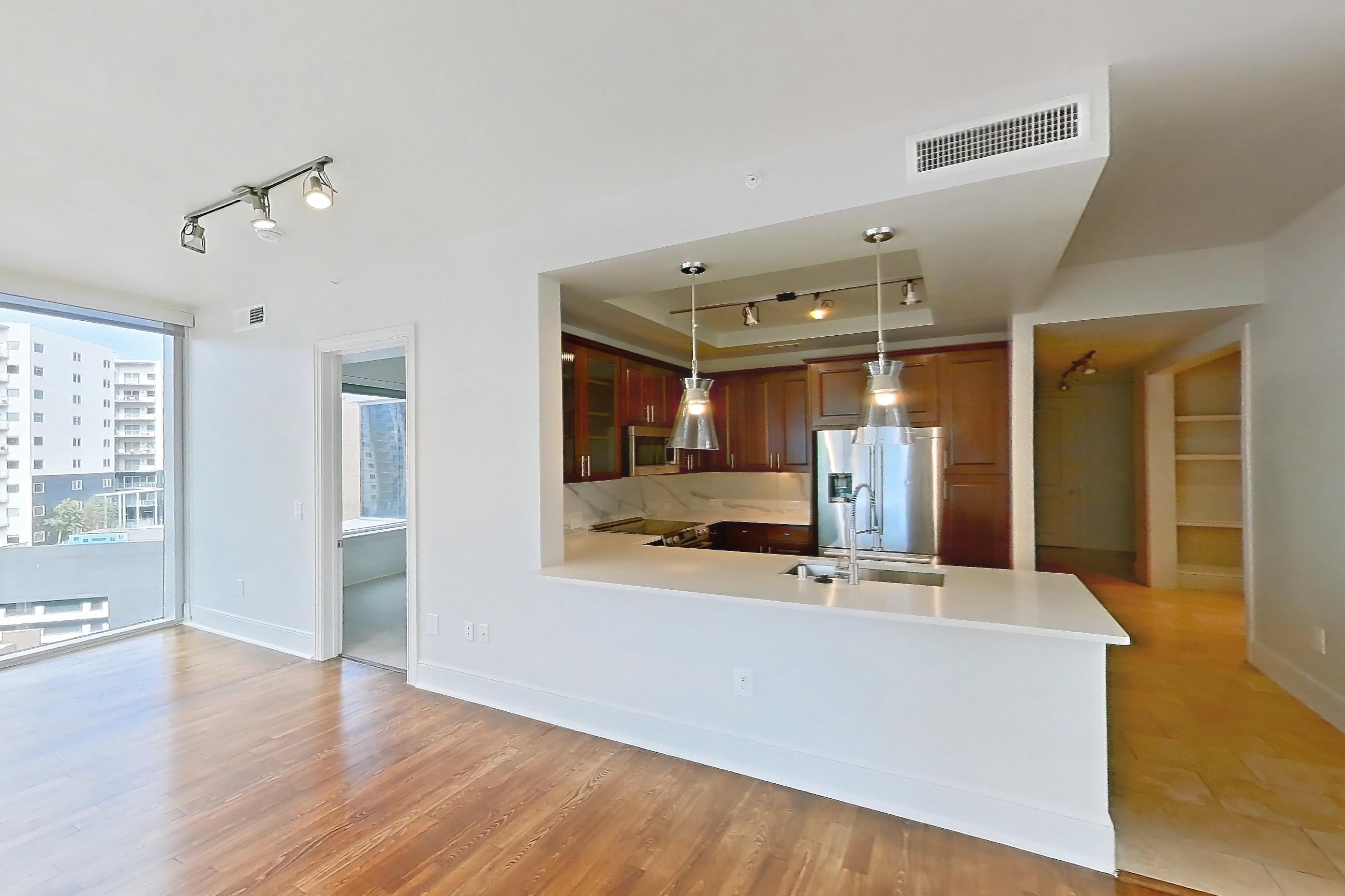 Living room in a B4a - Uptown floor plan apartment, representative of Apartment 2201 at Cortland on McKinney