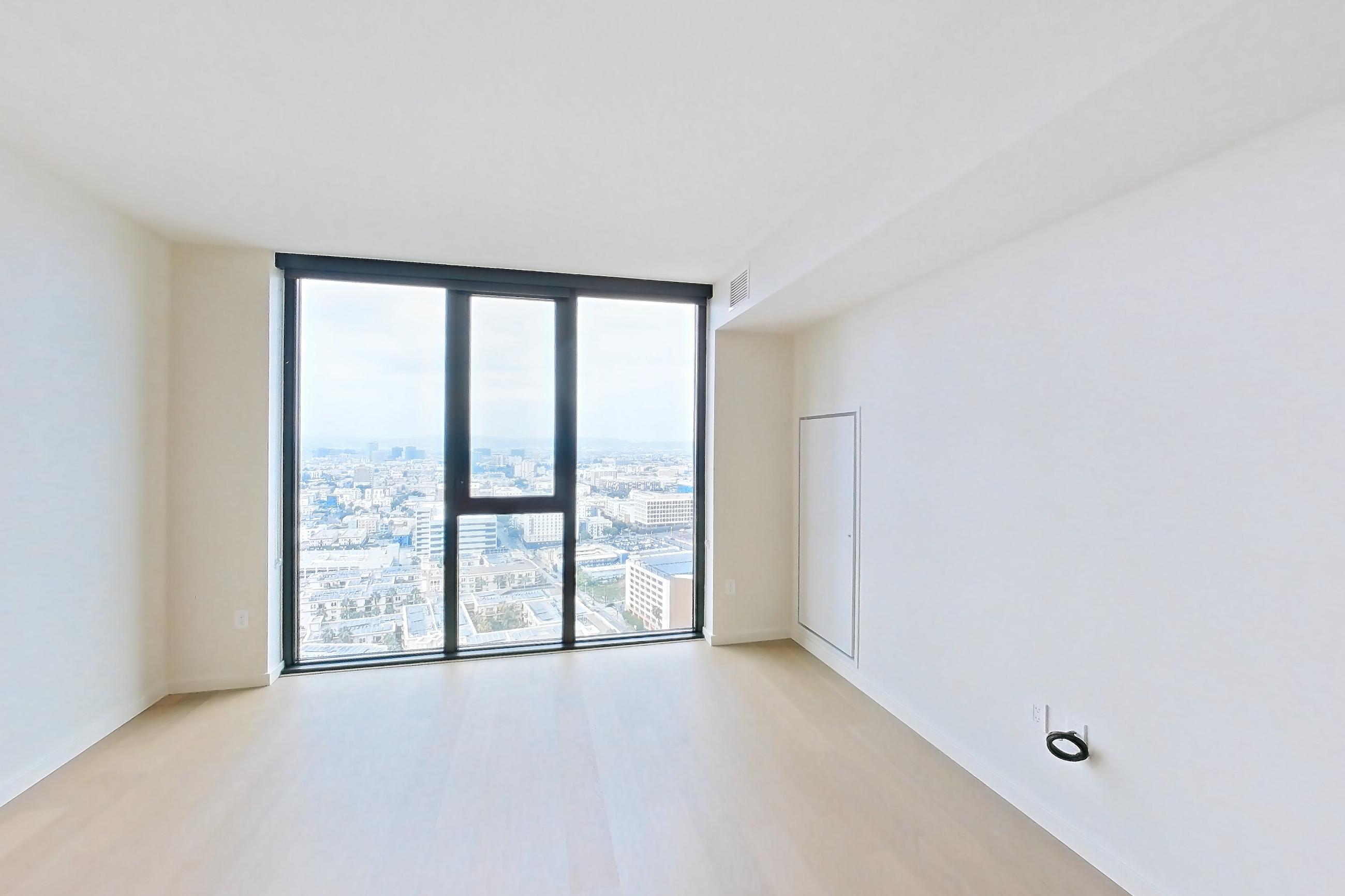 Living room with city view, Apartment B-3004 at Beaudry