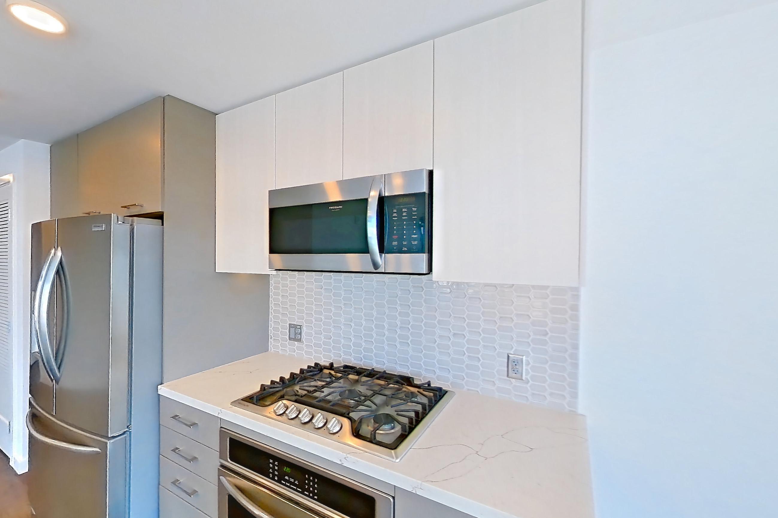 Kitchen in Apartment 0-1012 at Merian, 2M floor plan