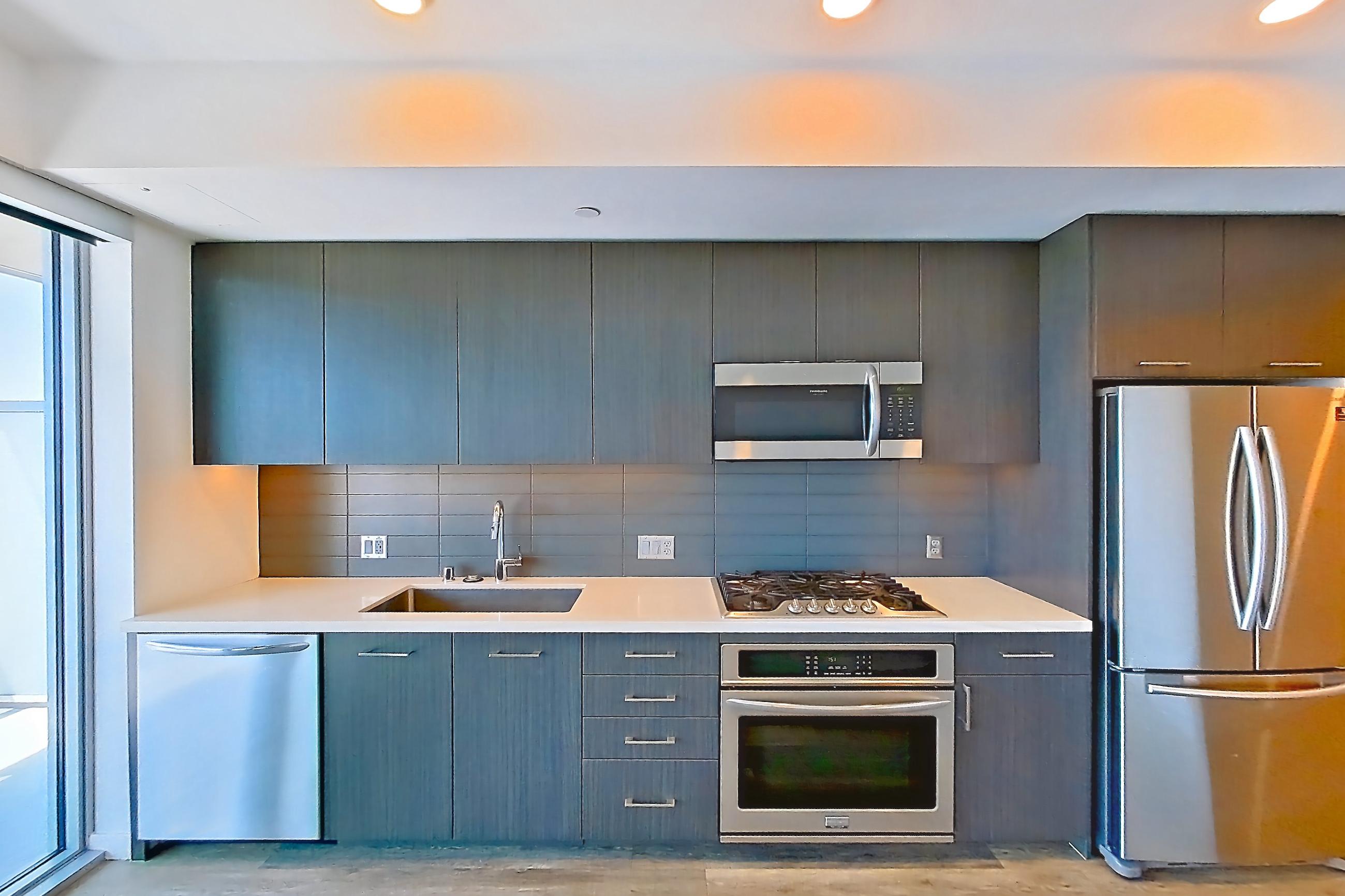 Kitchen in Apartment 0-1706 at Merian, Jr 1C floor plan
