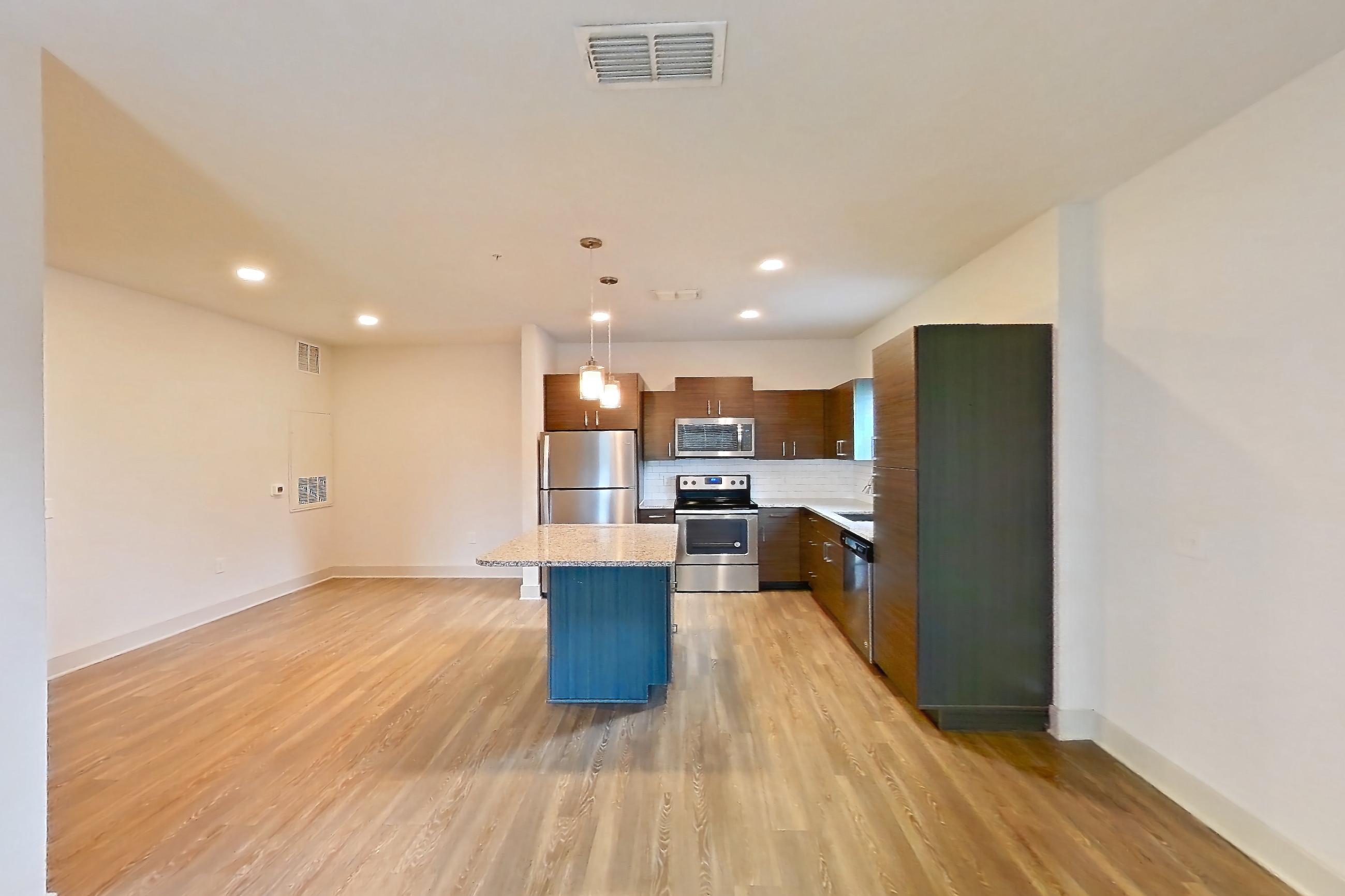 Living room in Apartment 140-203 at Domain, 1C floor plan