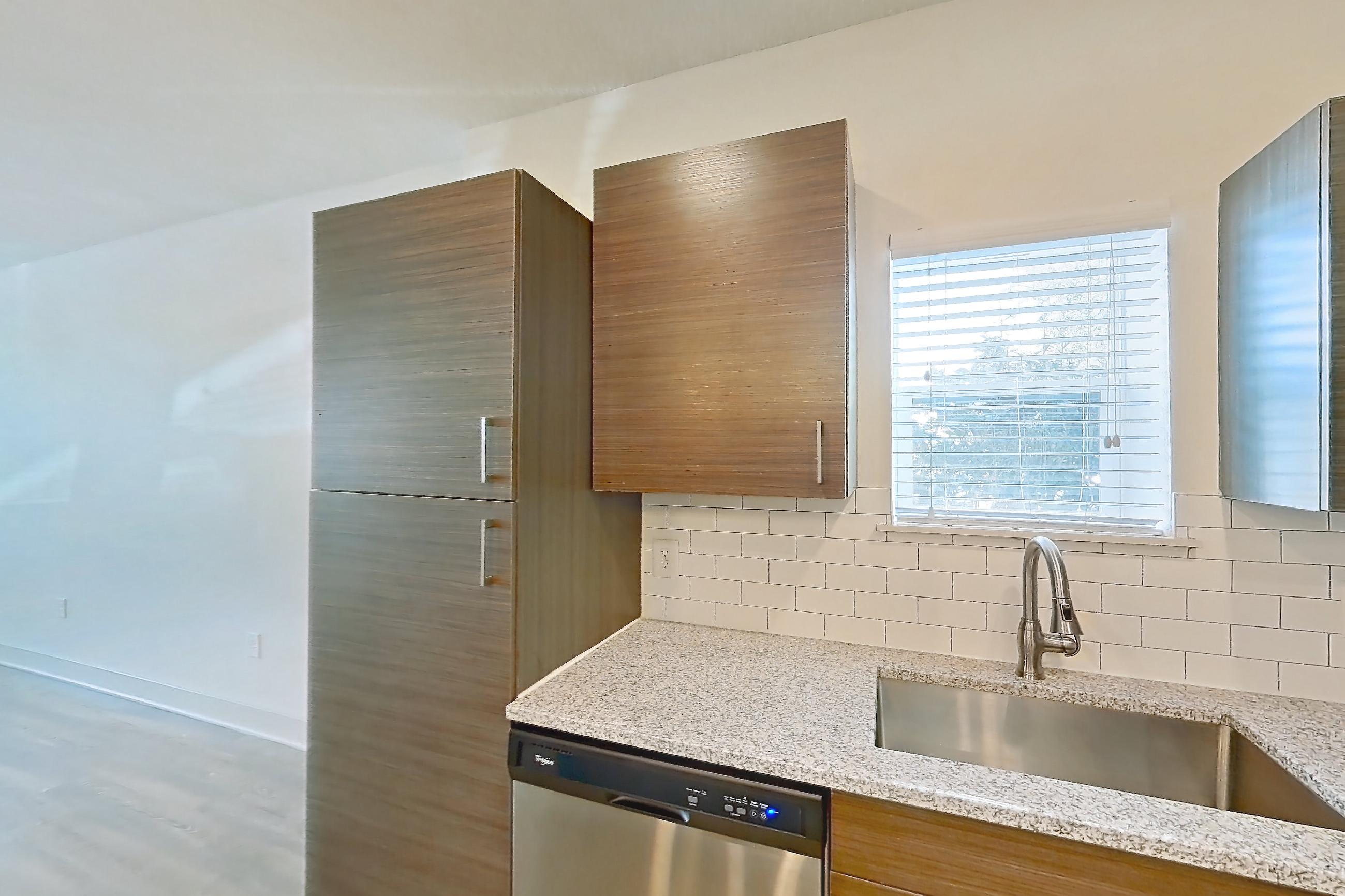 Kitchen in Apartment 140-101 at Domain, 1D floor plan