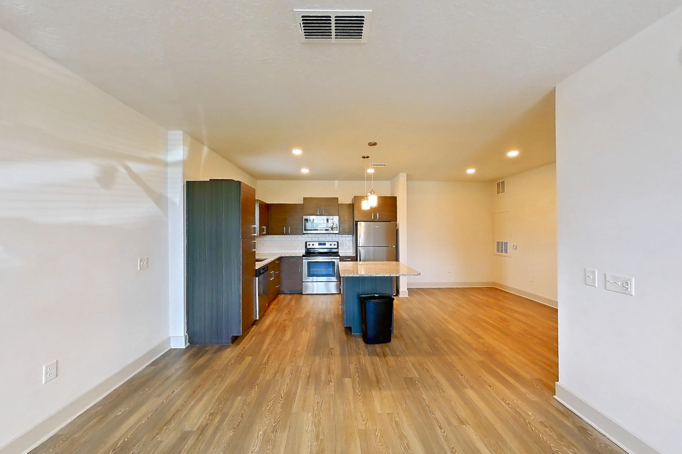 Living room in Apartment 140-101 at Domain, 1D floor plan
