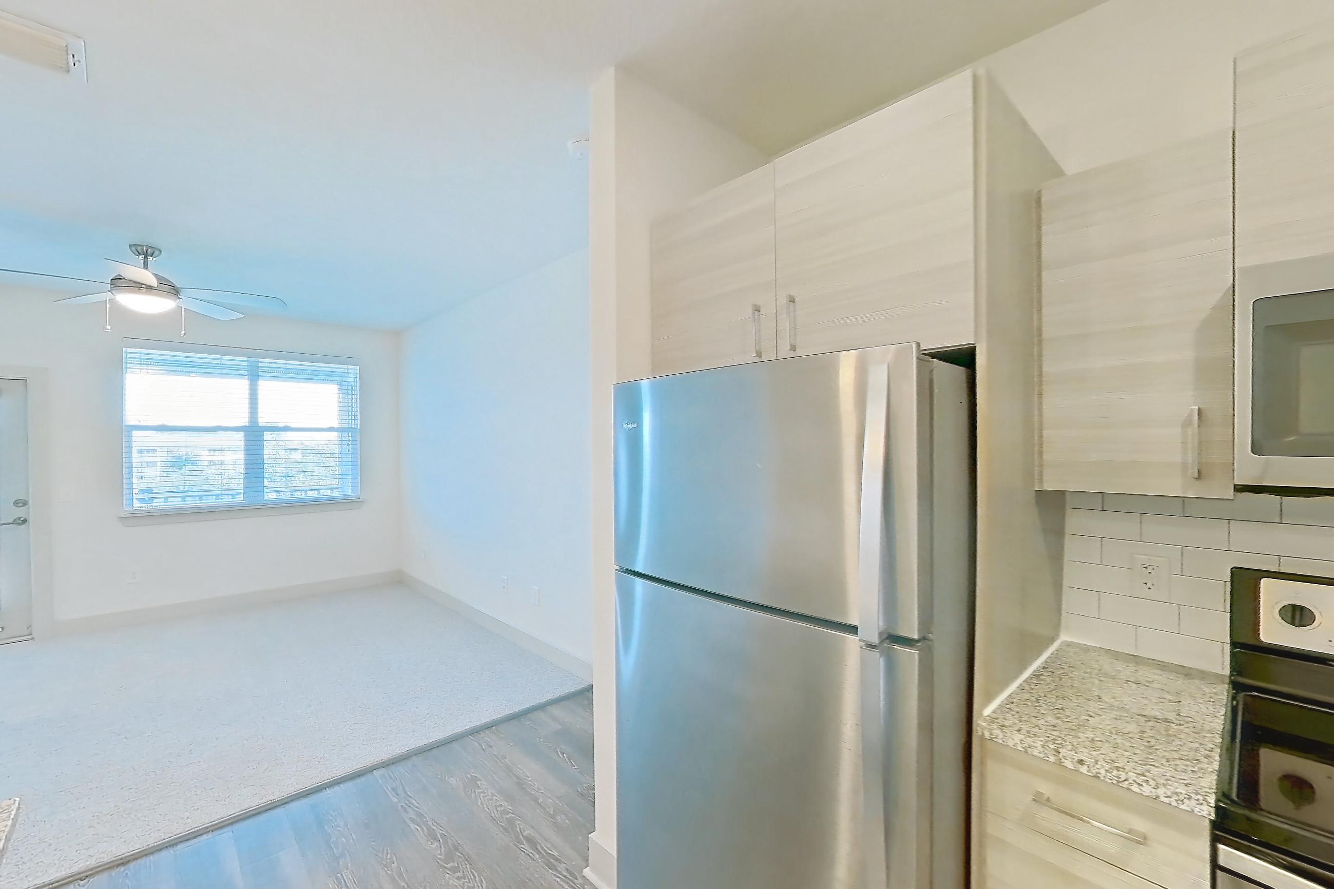 Kitchen in Apartment 104-304 at Domain, 2A floor plan