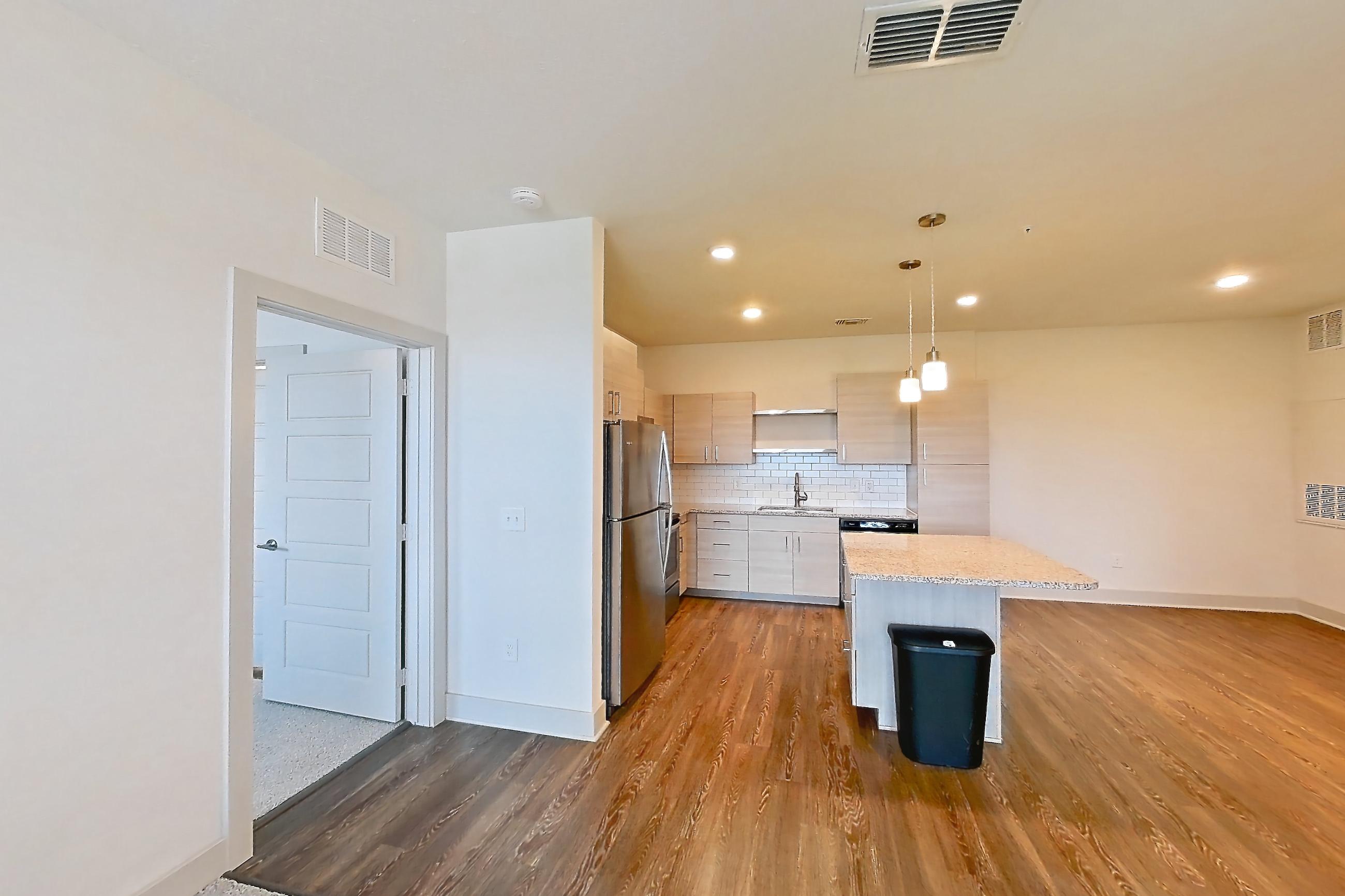 Living room in Apartment 104-304 at Domain, 2A floor plan