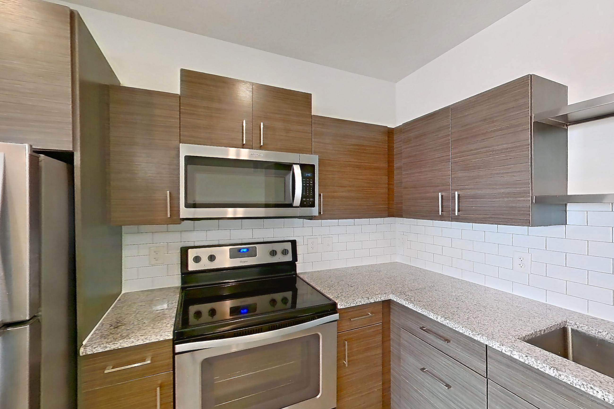Kitchen in Apartment 150-301 at Domain, 2C floor plan