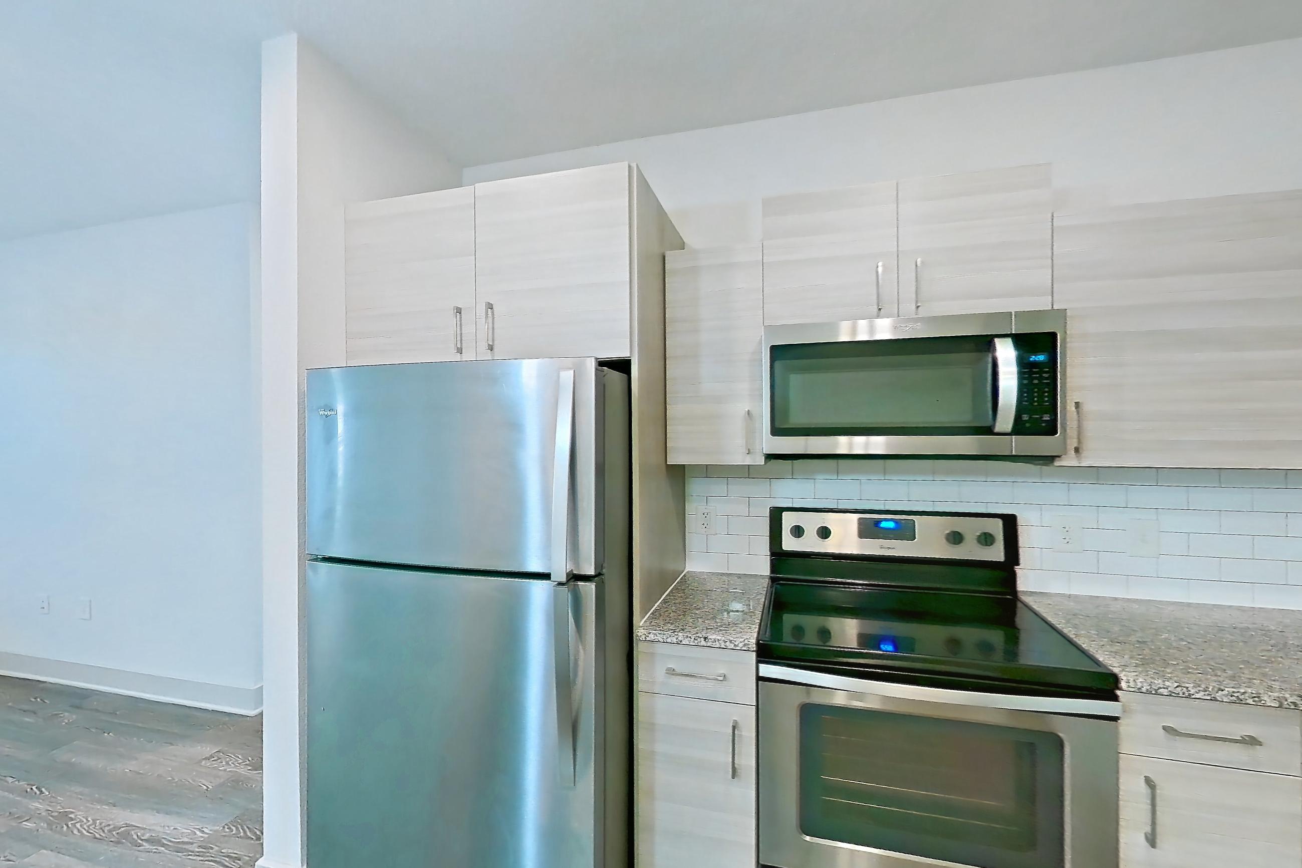 Kitchen in Apartment 146-104 at Domain, 3A floor plan