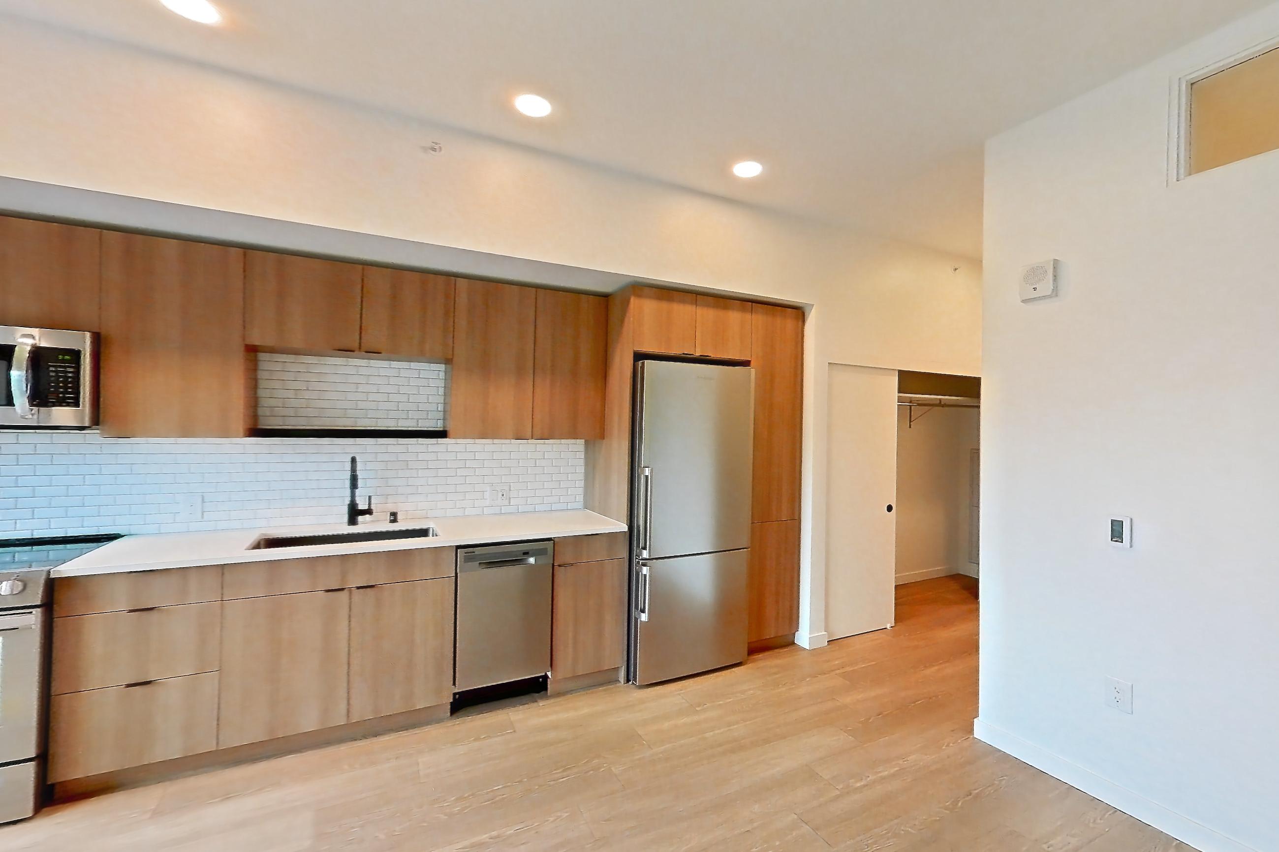 Living room in Apartment 122 at Ballard Yards, A5A floor plan