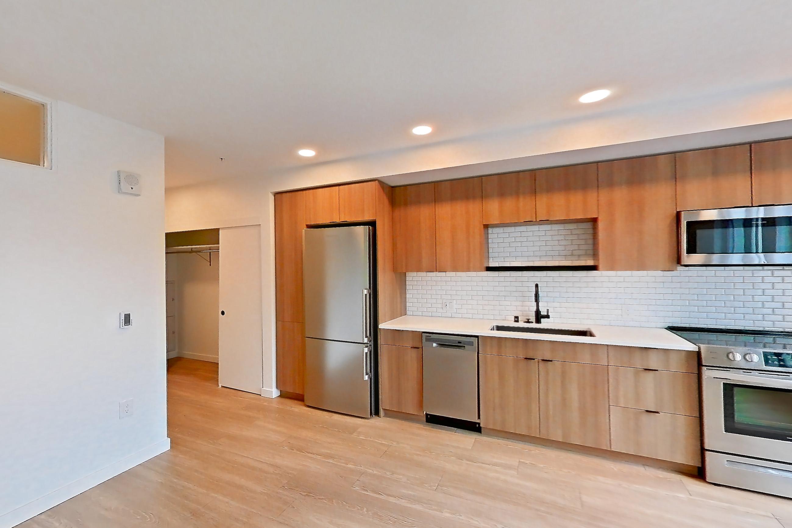 Living room, Apartment 519 at Ballard Yards