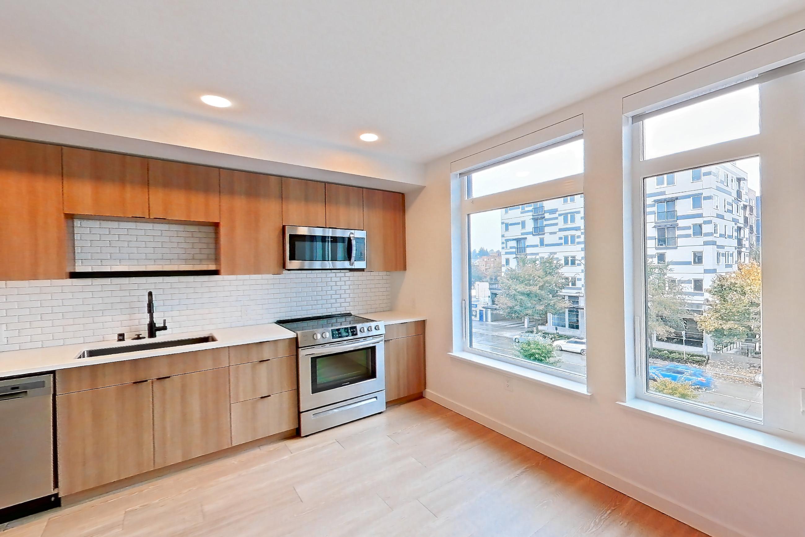 Living room, Apartment 519 at Ballard Yards