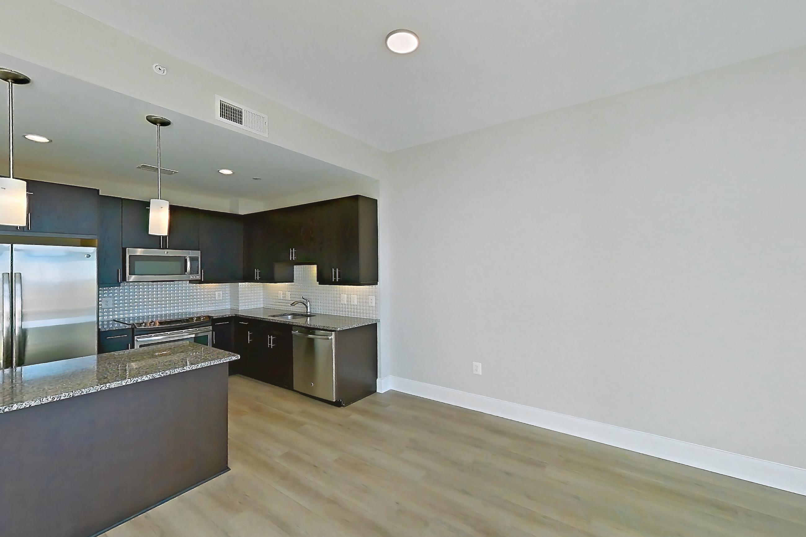 Living room, Apartment 1420 at The Avant at Reston Town Center
