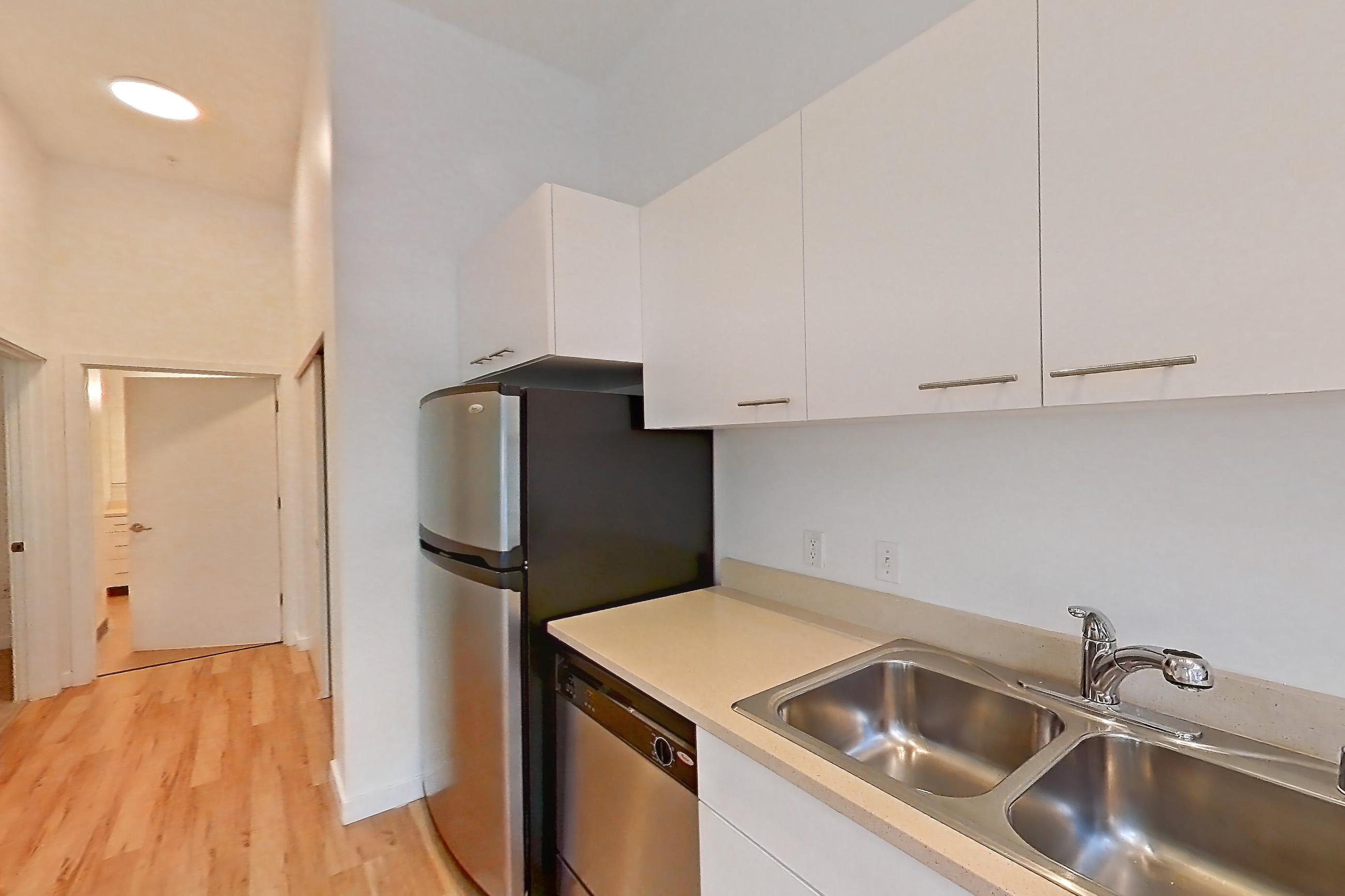 Kitchen in Apartment 0112 at Circa Greenlake, 1 Bedroom 1 Bath - A1.1 floor plan
