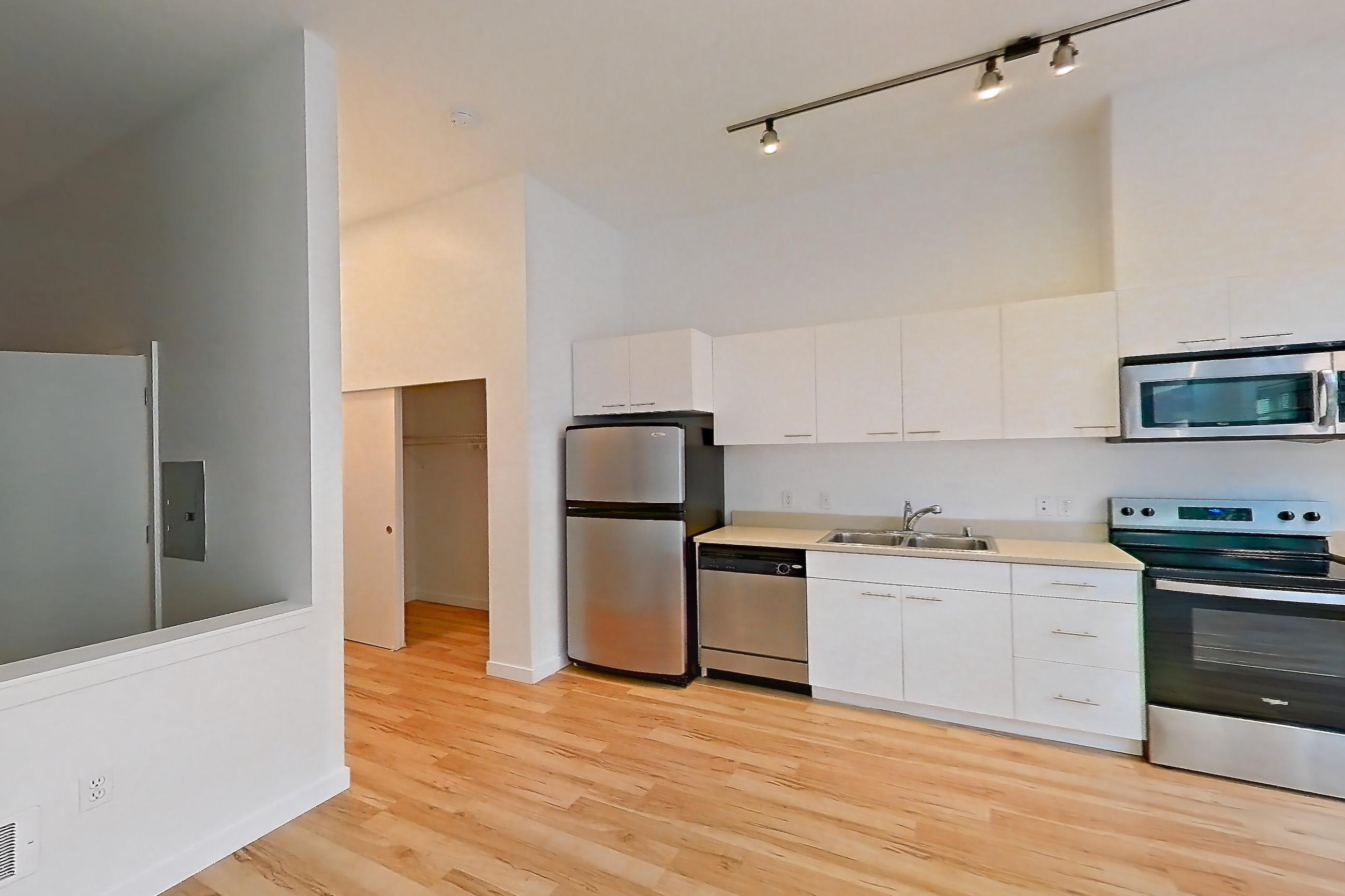 Living room in Apartment 0112 at Circa Greenlake, 1 Bedroom 1 Bath - A1.1 floor plan