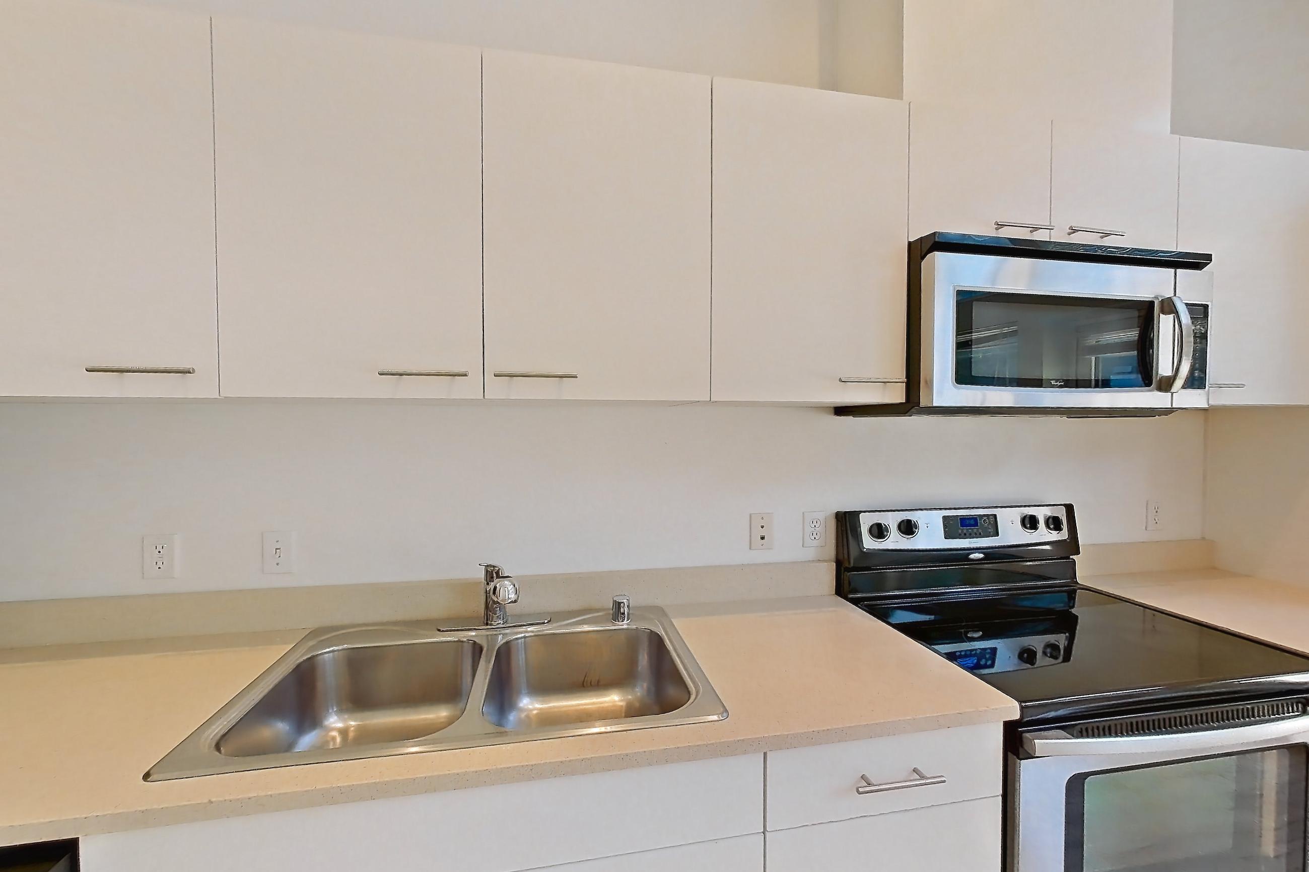 Kitchen in a 1 Bedroom 1 Bath - A1.1 floor plan apartment, representative of Apartment 0112 at Circa Greenlake