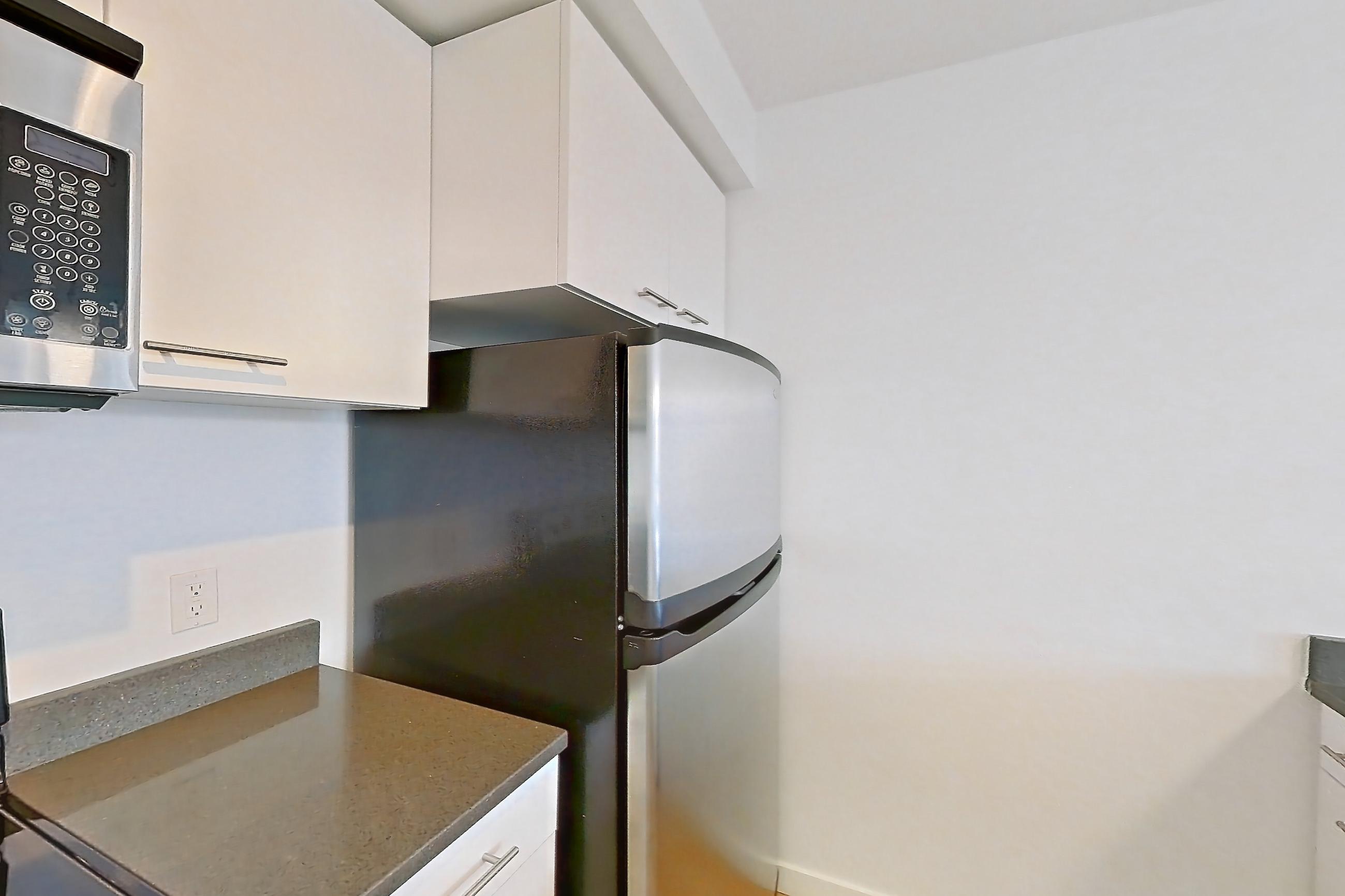 Kitchen in a 2 Bedroom 2 Bath - B4.2 floor plan apartment, representative of Apartment 0420 at Circa Greenlake