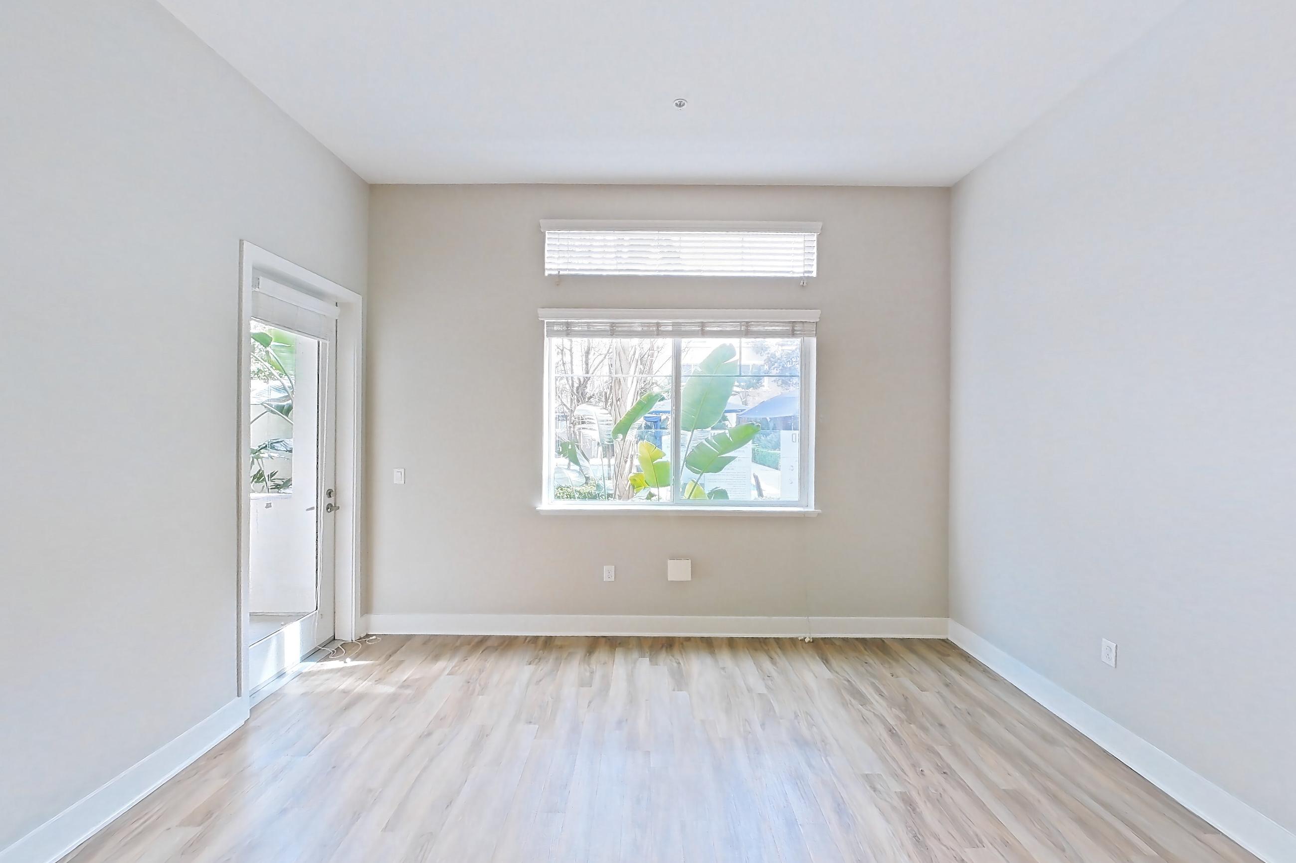 Living room with light wood-finish flooring, Apartment 0-1086 at Alder