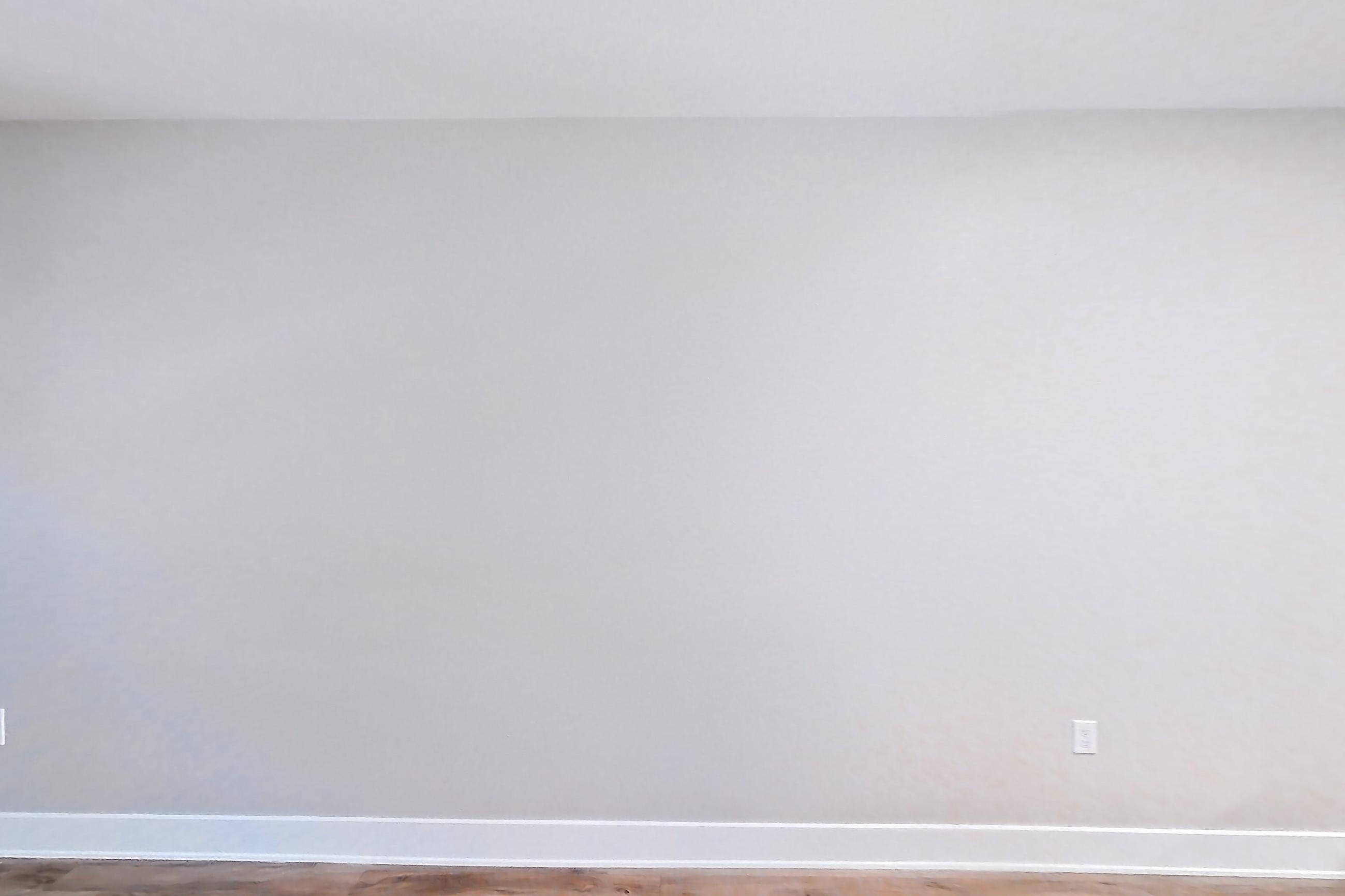 Living room with light wood-finish flooring, Apartment 0-3019 at Alder