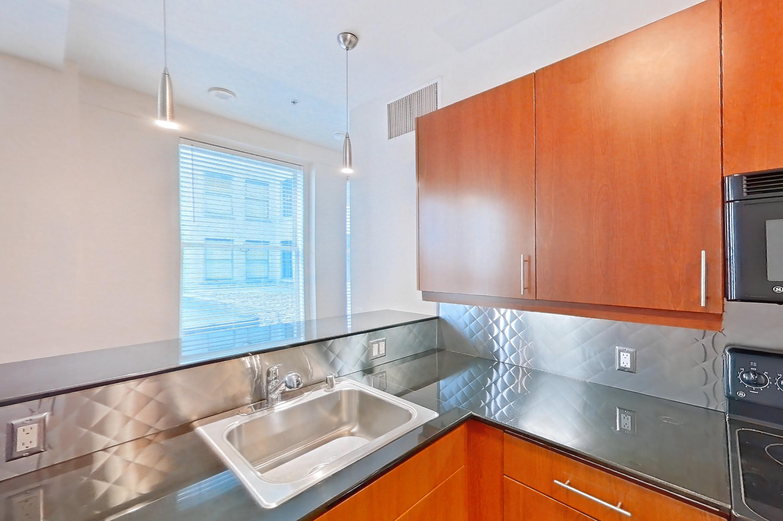Kitchen in Apartment 00-0434 at Metro 417, 1N floor plan