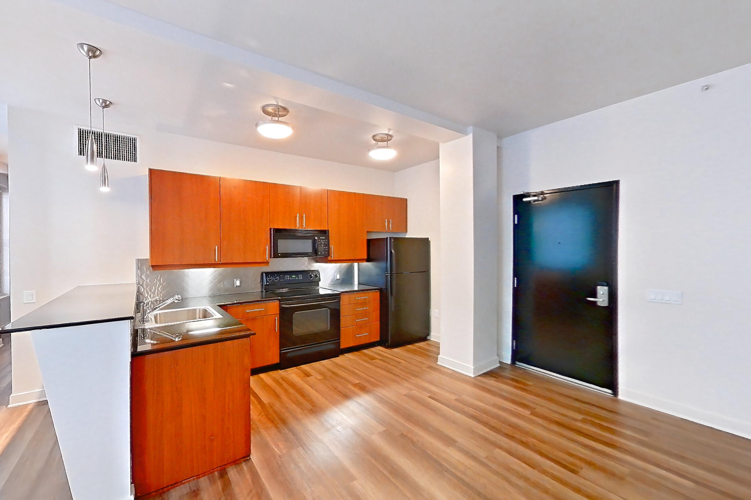 Living room in Apartment 00-0434 at Metro 417, 1N floor plan