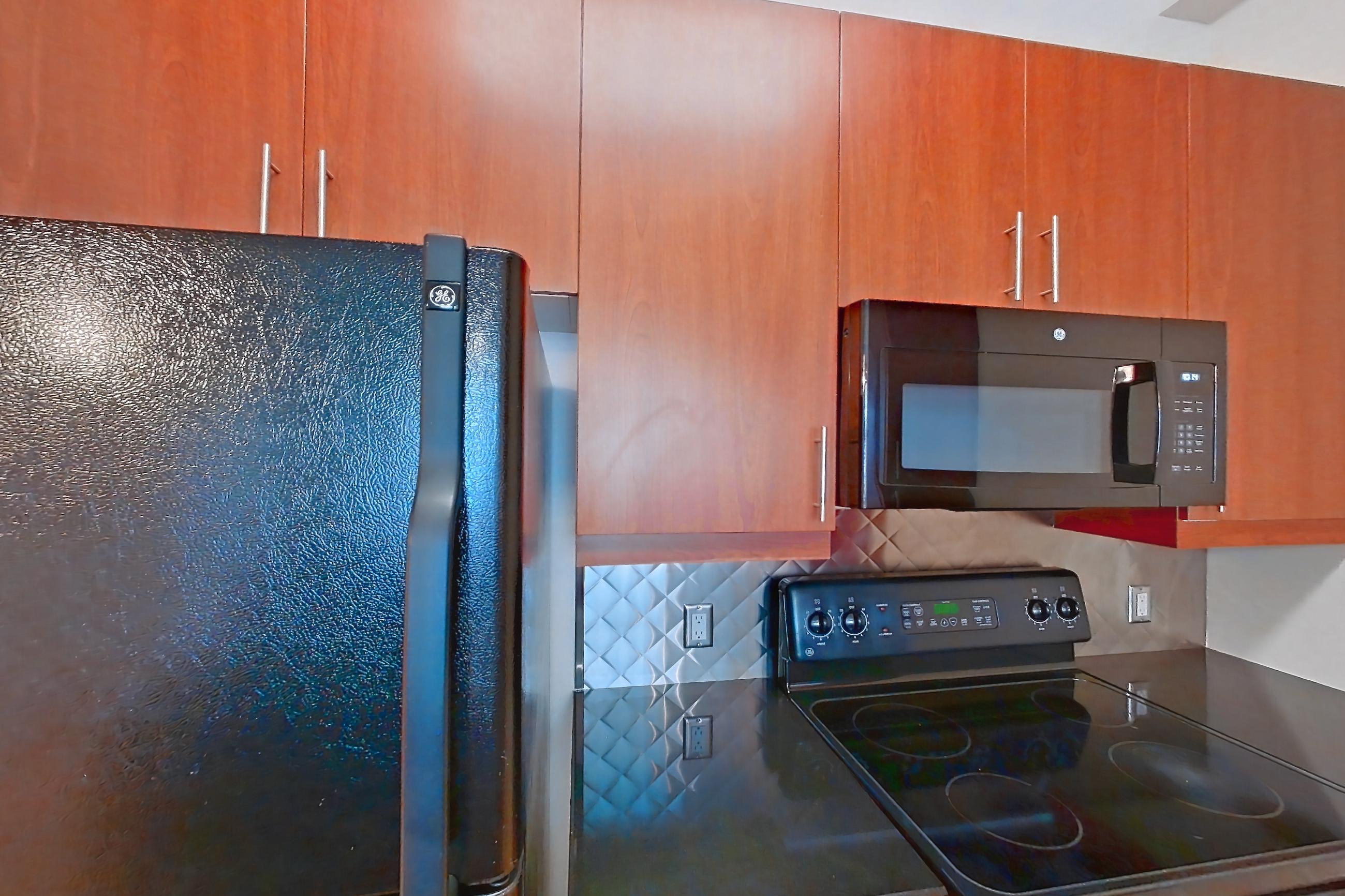 Kitchen in Apartment 00-0730 at Metro 417, 2B floor plan